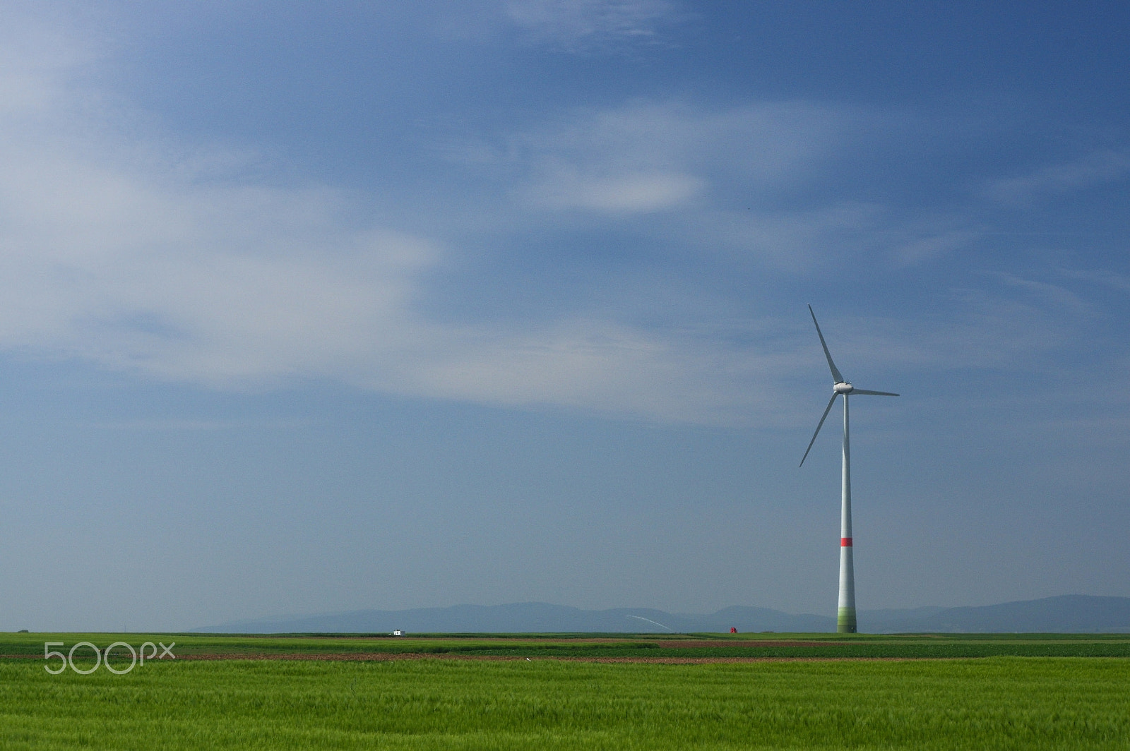 Pentax K-3 + smc PENTAX-DA L 18-55mm F3.5-5.6 AL WR sample photo. Green meadow with wind turbines generating electricity photography