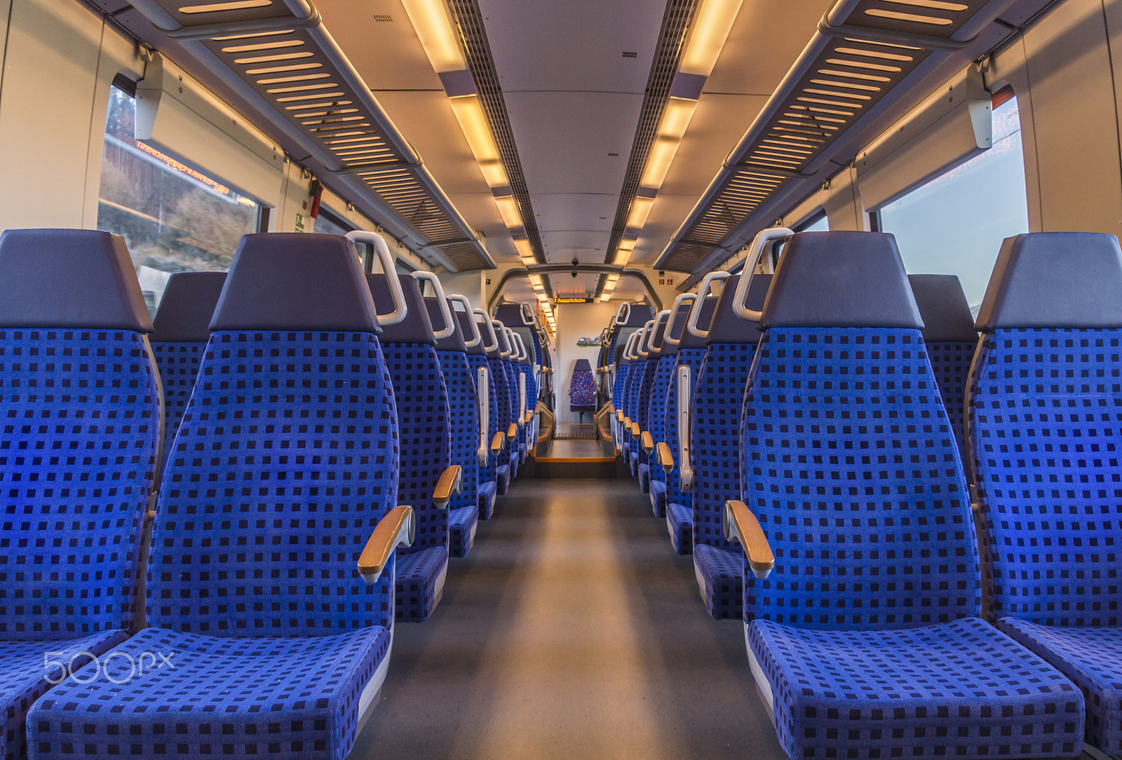 Nikon D3200 sample photo. Empty train chairs photography