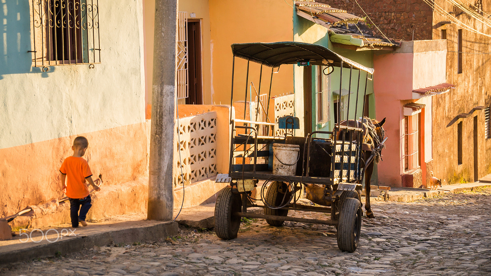 Sony SLT-A37 sample photo. Horse carriage on streetside in trinidad, cuba at sunset photography