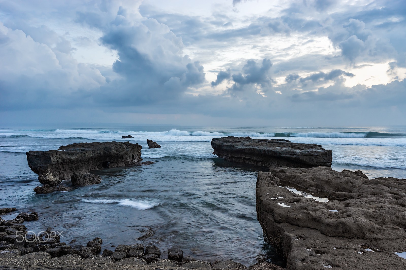 Sony a7 II + ZEISS Batis 25mm F2 sample photo. Coastline with rocks and stones. bali. indonesia. photography