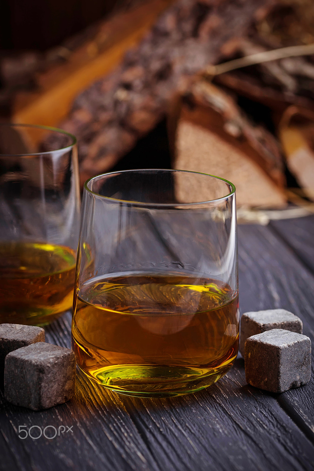 Nikon D3100 + Sigma 105mm F2.8 EX DG OS HSM sample photo. Glass of whiskey with stones photography