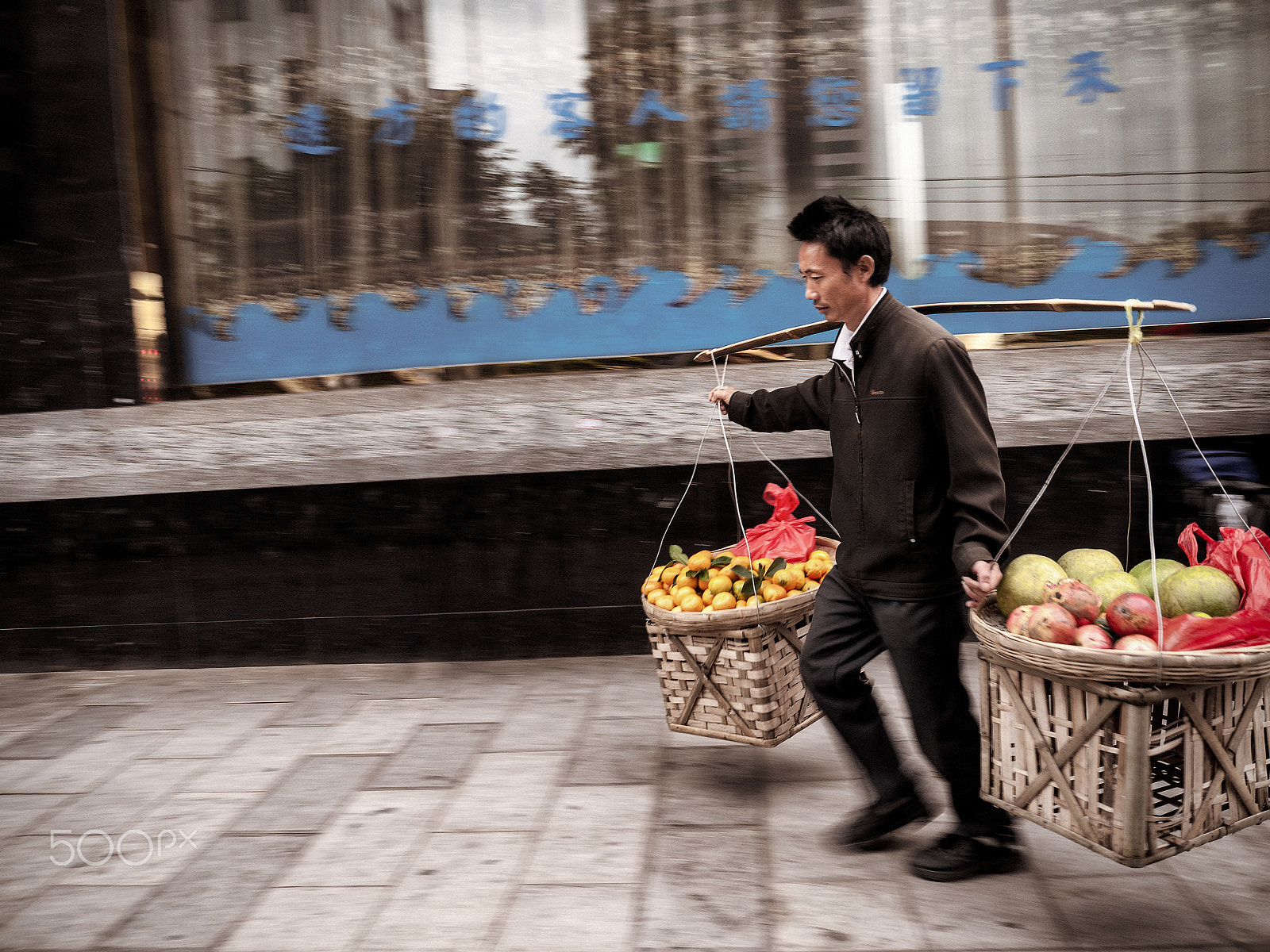 Panasonic Lumix DMC-GF1 sample photo. Chinese hawker.. photography