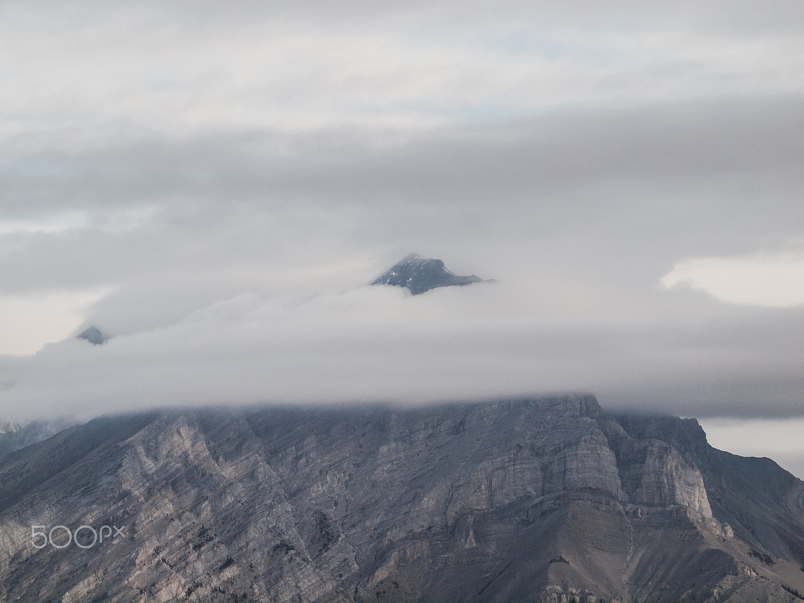 Olympus Zuiko Digital ED 70-300mm F4.0-5.6 sample photo. Peeping above the clouds photography