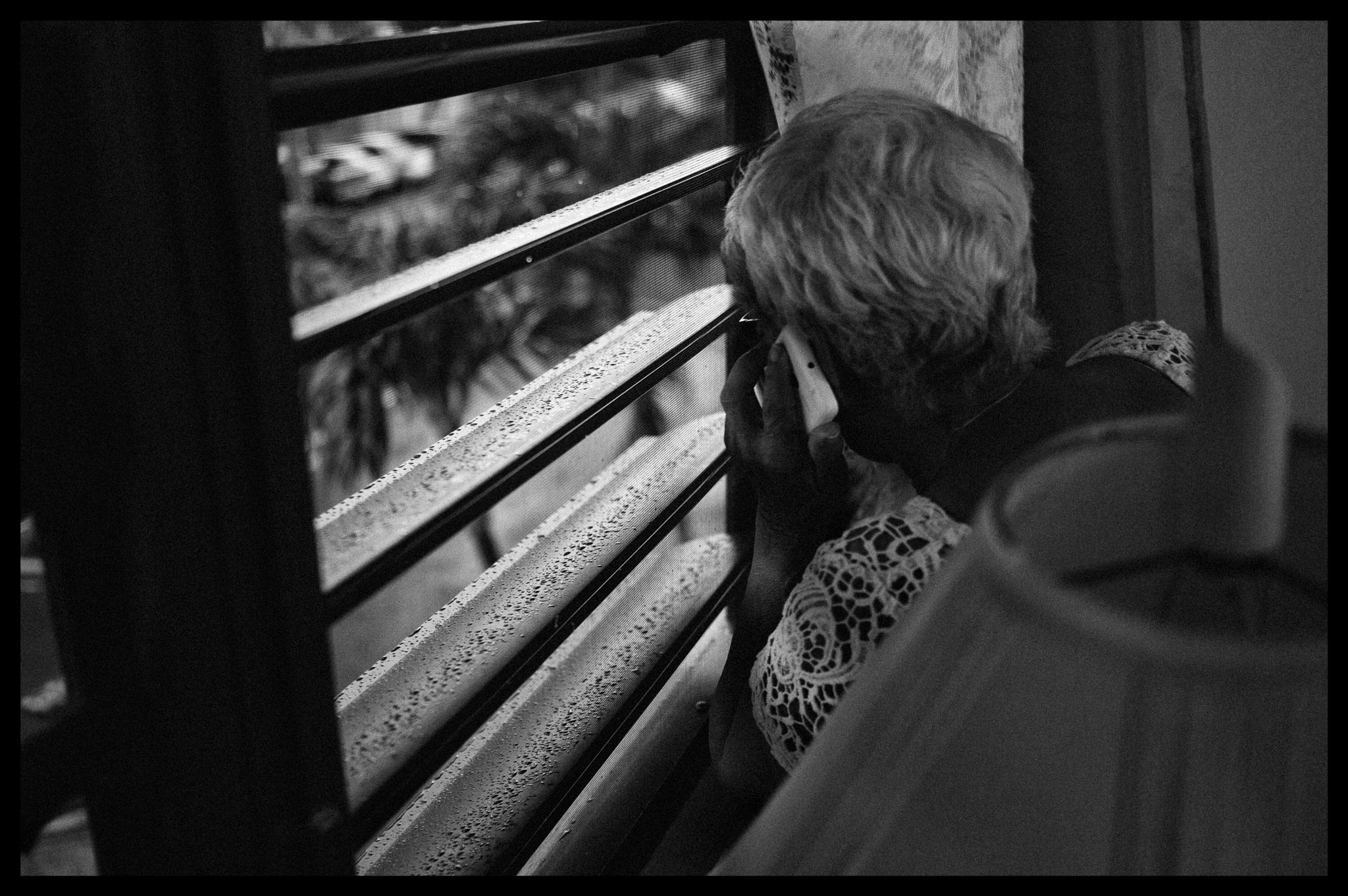 Leica M9 + Leica Summicron-M 35mm F2 ASPH sample photo. Waiting at the window. grandma always making sure that we get home alright. photography