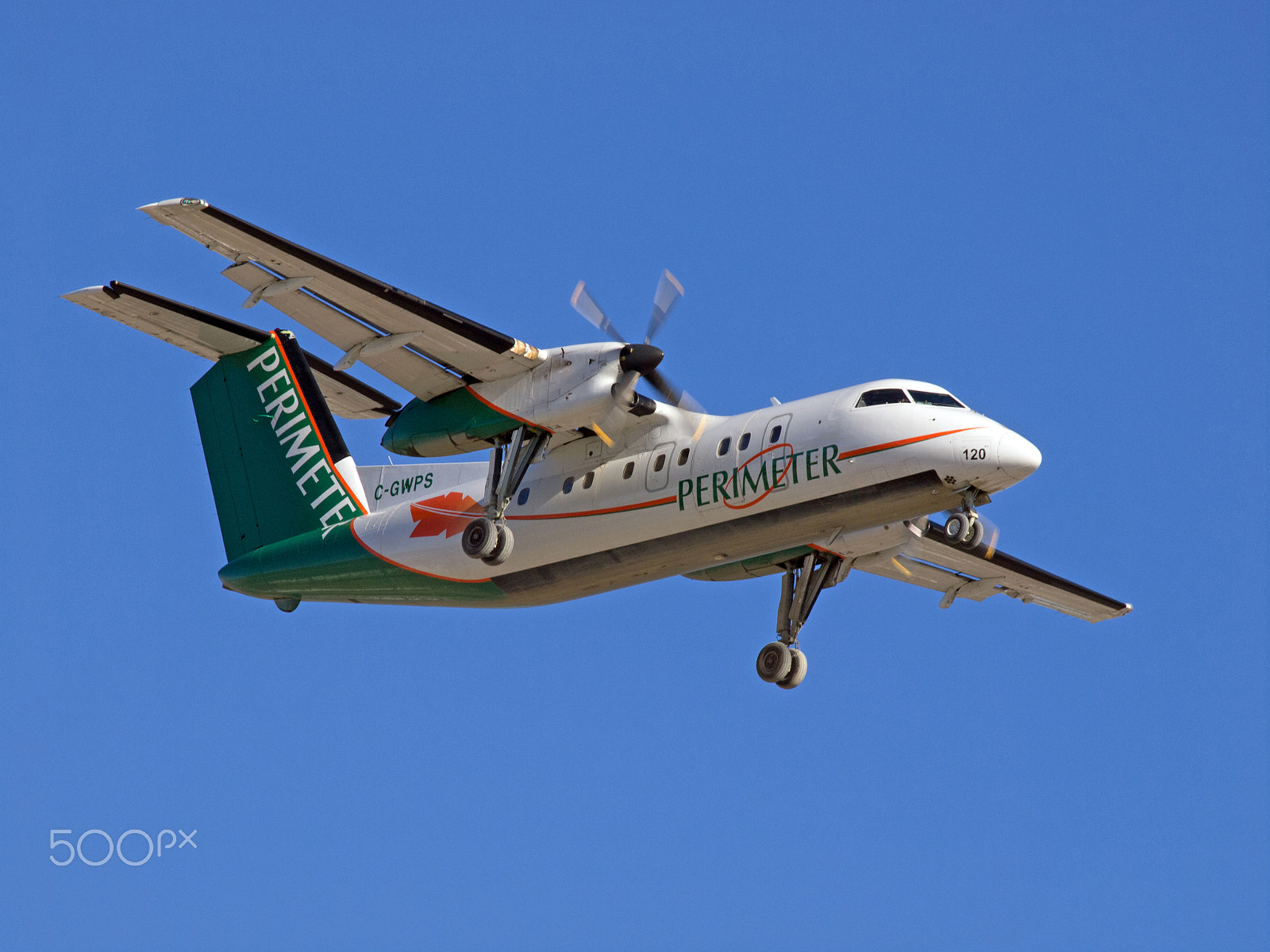 Olympus E-5 sample photo. Perimeter aviation dash-8 photography