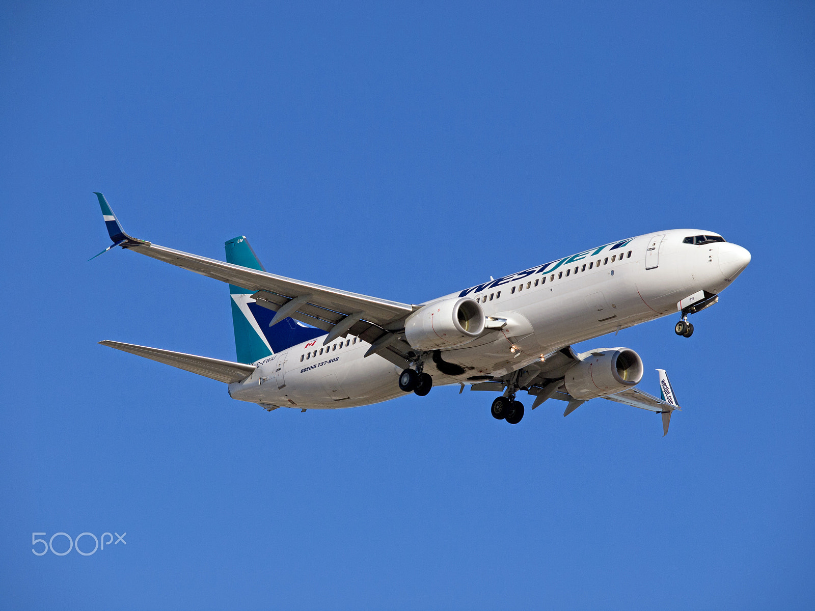 Olympus E-5 sample photo. Westjet boeing b-737-800 with split scimitar winglets photography