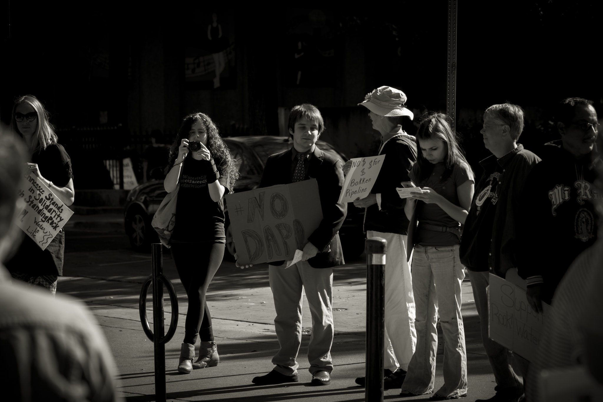 Sony a6000 + Sony FE 90mm F2.8 Macro G OSS sample photo. Protesters gathering 9 photography