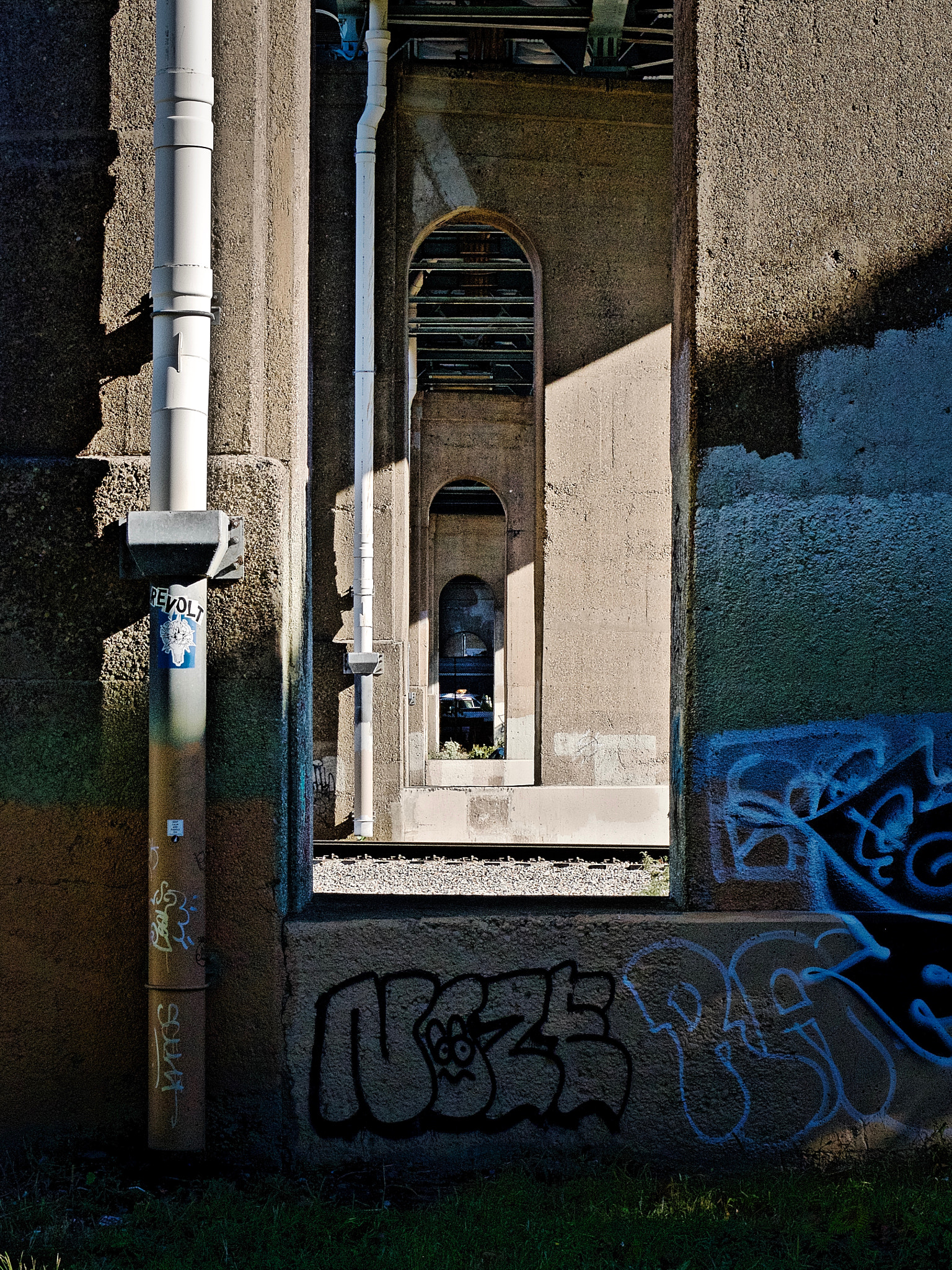 Panasonic Leica DG Nocticron 42.5mm F1.2 ASPH OIS sample photo. Bridge graffiti photography