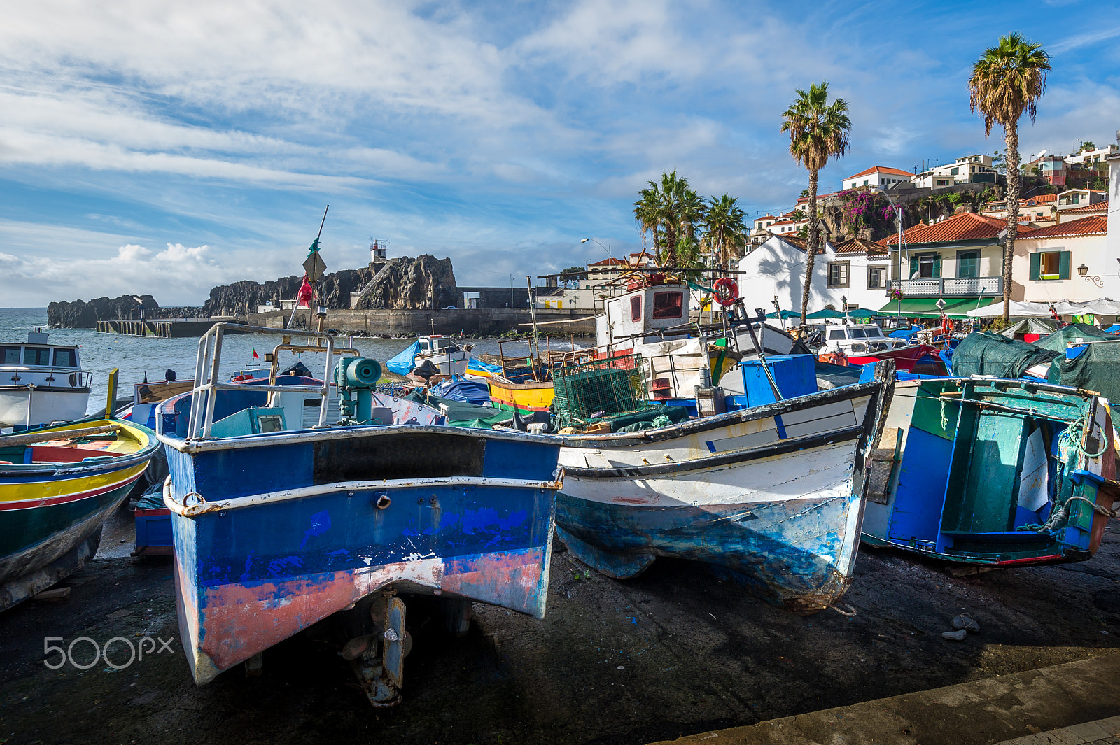 Nikon D3S sample photo. Abandoned fishing boats laying on the shore in camara de lobos marina photography
