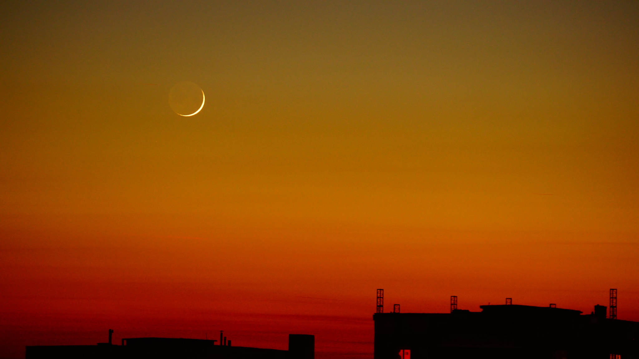 Sony SLT-A68 + Sony DT 55-300mm F4.5-5.6 SAM sample photo. Moon sinking in the sunset photography