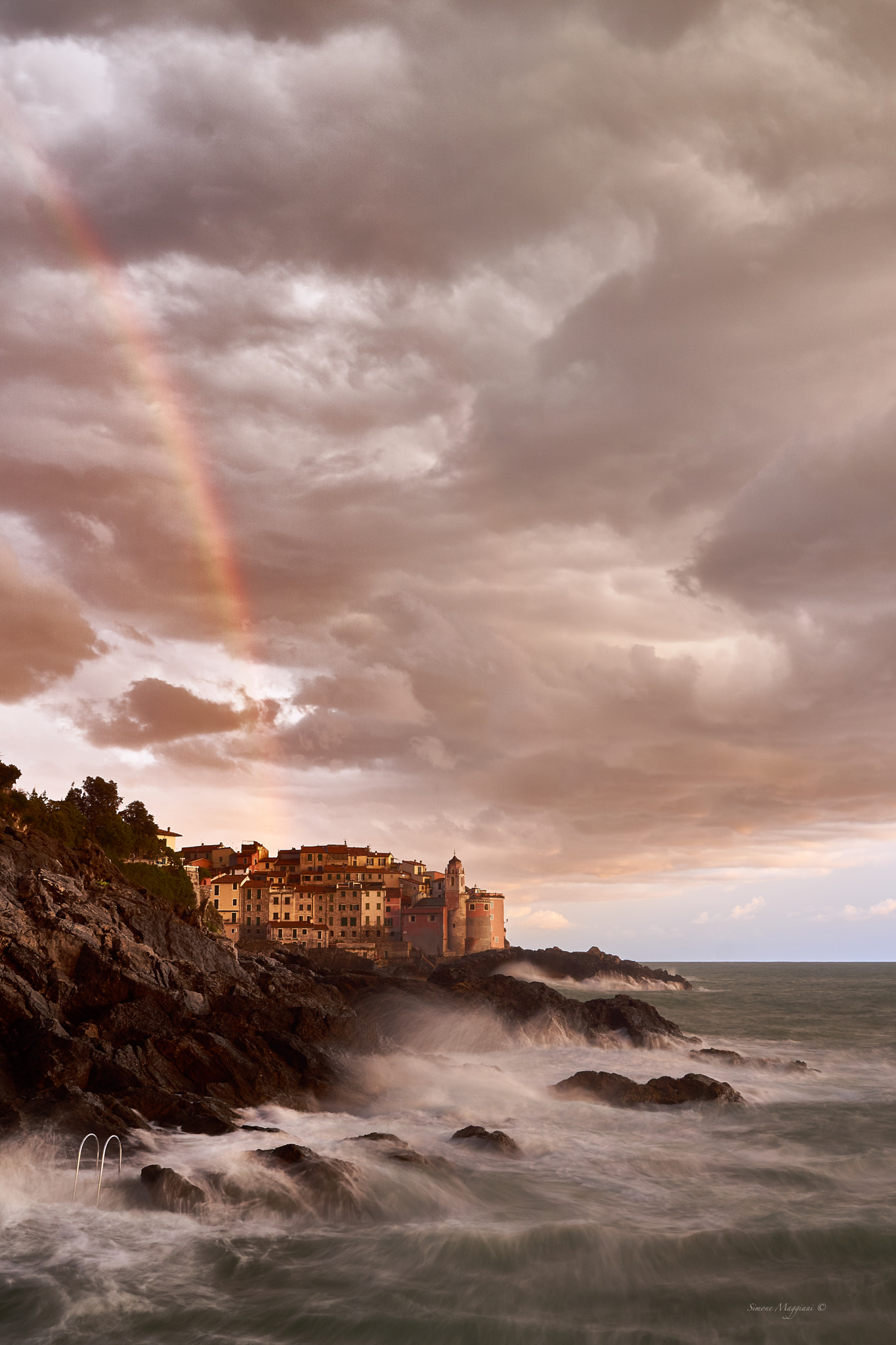 Sony FE 28mm F2 sample photo. Rainbow in storm photography