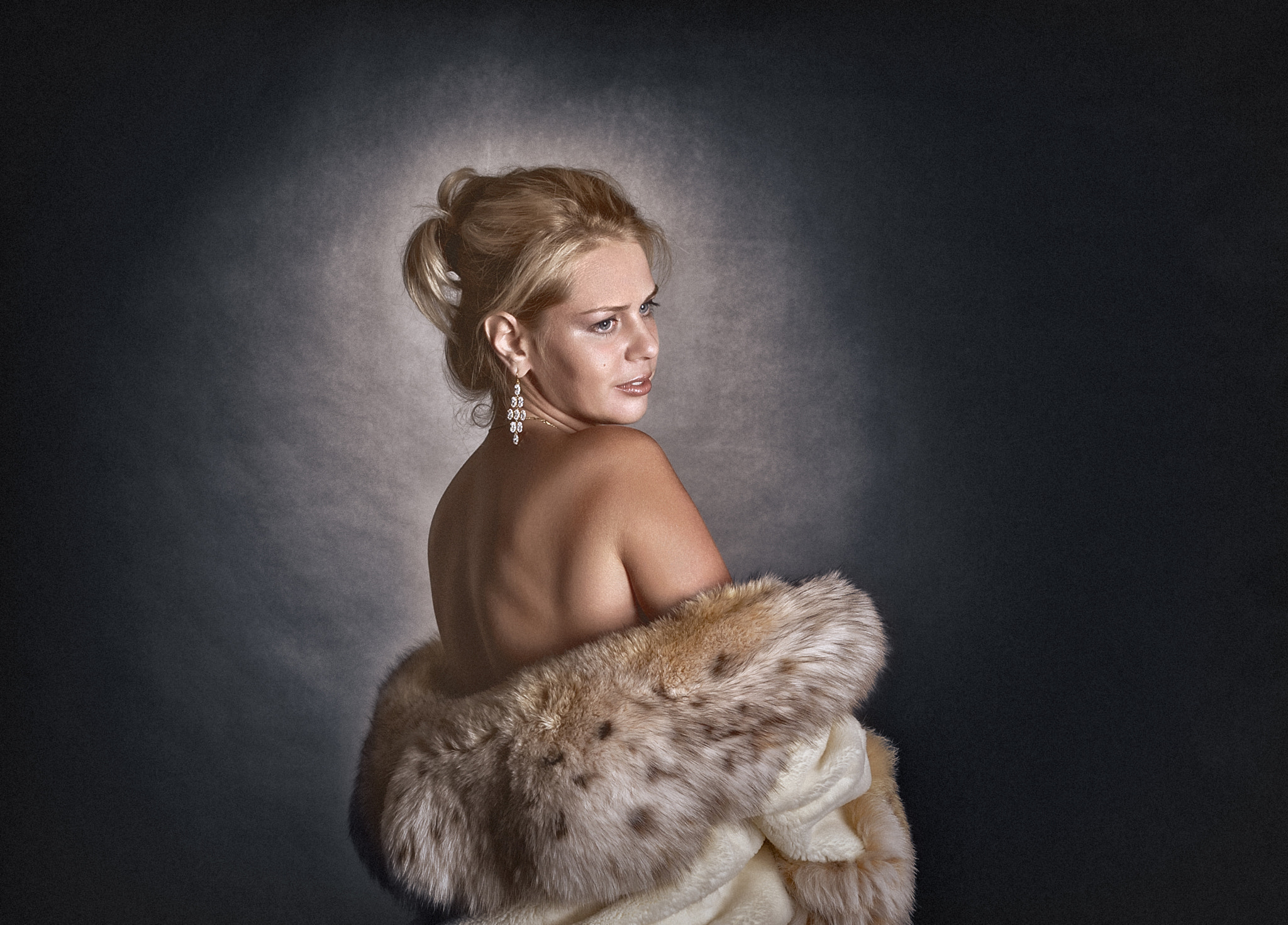 Nikon D300 + Nikon AF-S Nikkor 50mm F1.4G sample photo. Portrait of a beautiful young woman in a fur coat photography
