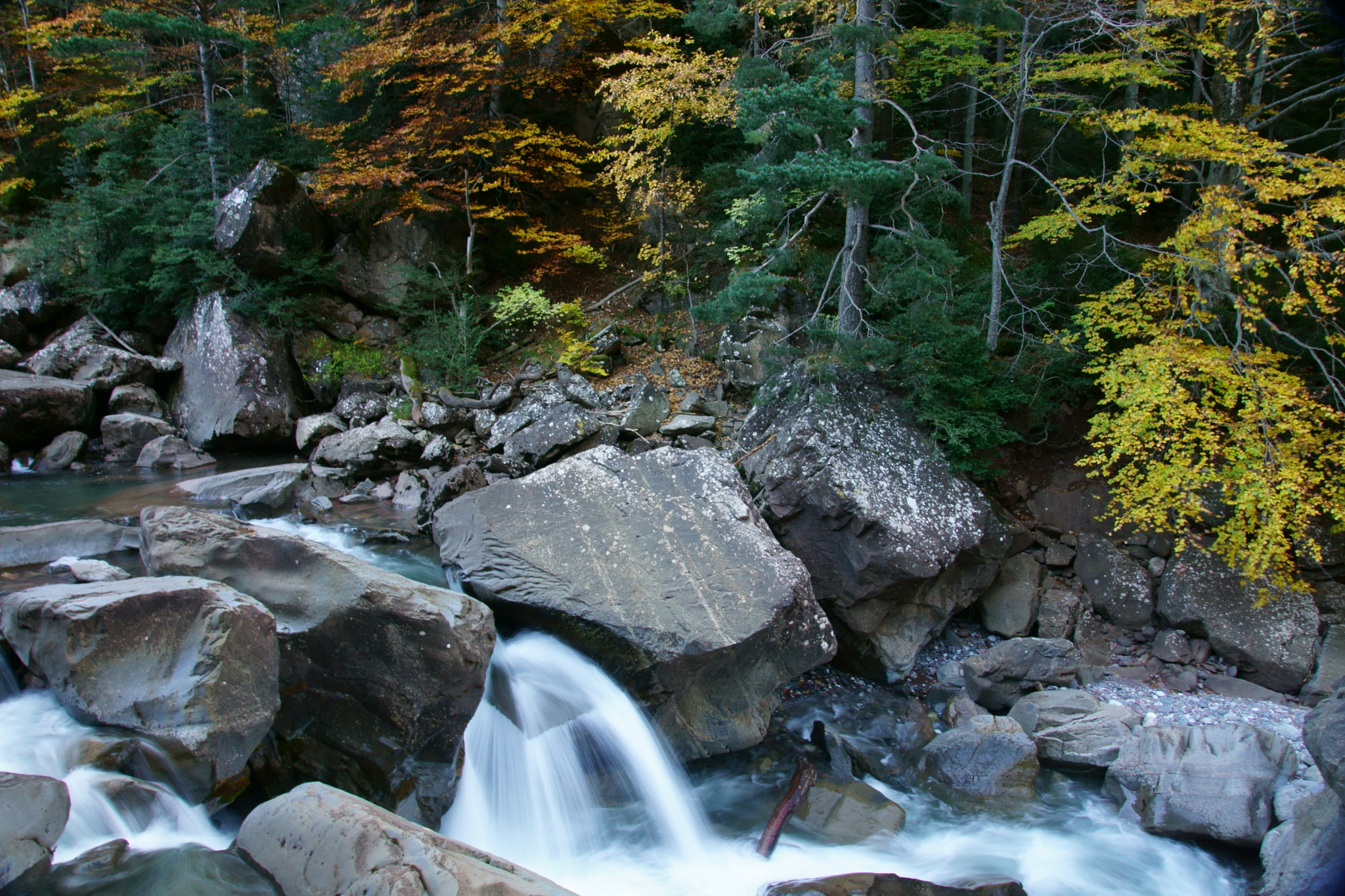 Sony DT 16-105mm F3.5-5.6 sample photo. Waterfall in selva de oza photography