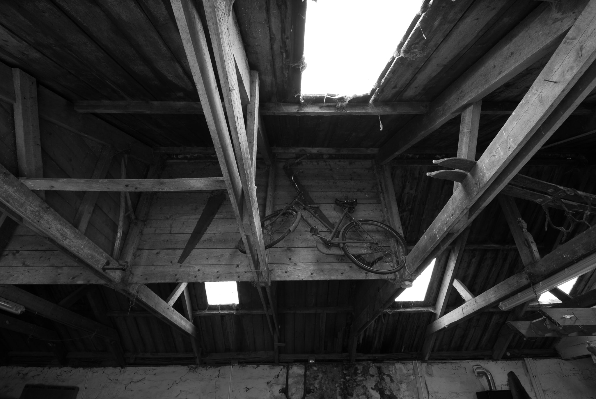 Nikon D200 + Tokina AT-X Pro 12-24mm F4 (IF) DX sample photo. Old barn rafters photography