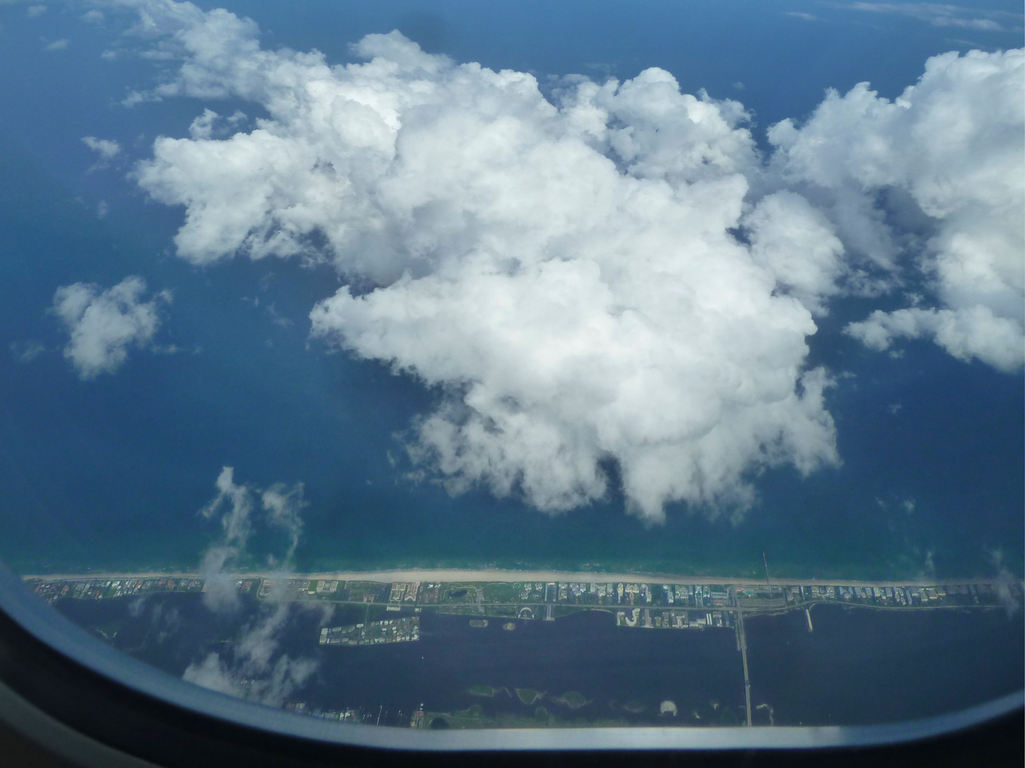 Panasonic Lumix DMC-ZS5 (Lumix DMC-TZ8) sample photo. Looking throug the window above miami photography