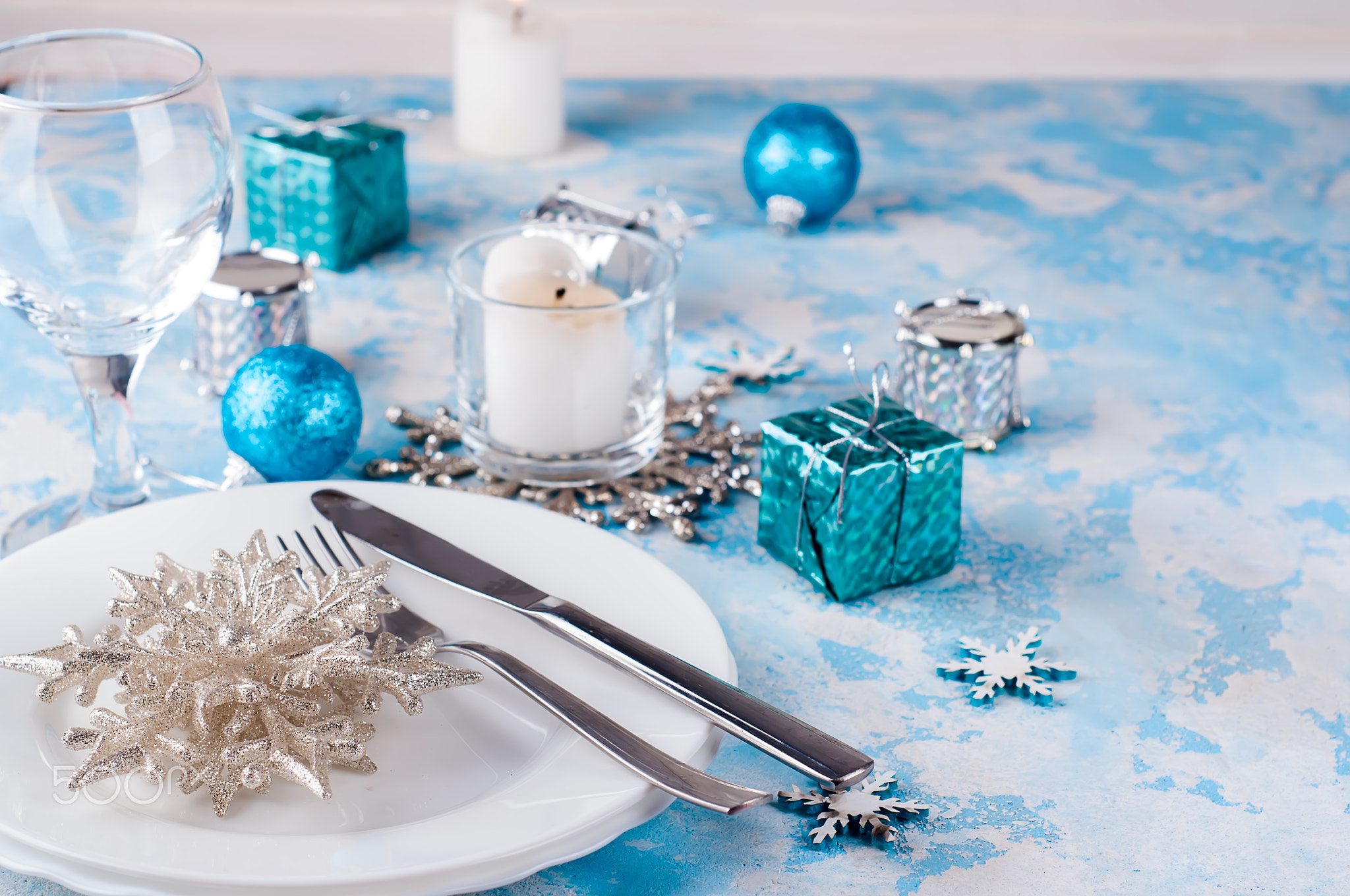 Silver and cream Christmas Table Setting with decorations