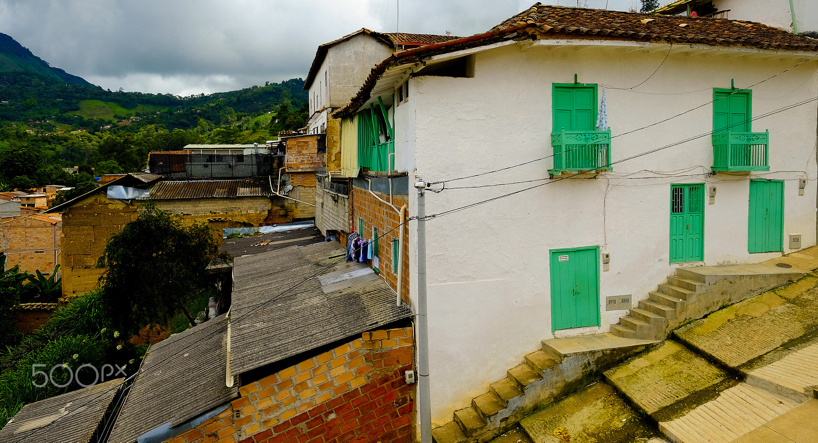 Fujifilm X-T10 + Fujifilm XF 14mm F2.8 R sample photo. The house with three doors and two windows photography