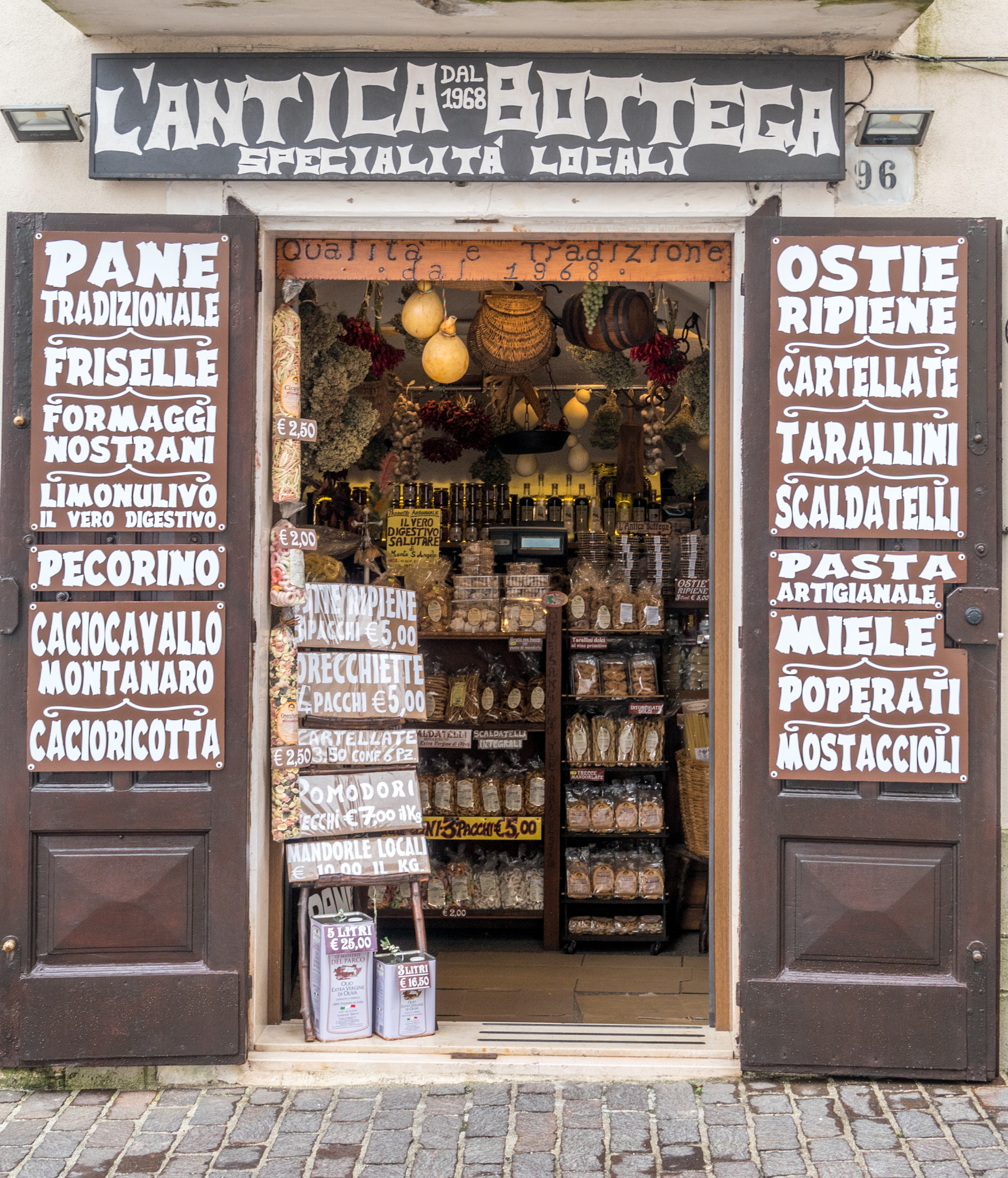 Olympus PEN-F sample photo. Store front - mount st michael italy photography