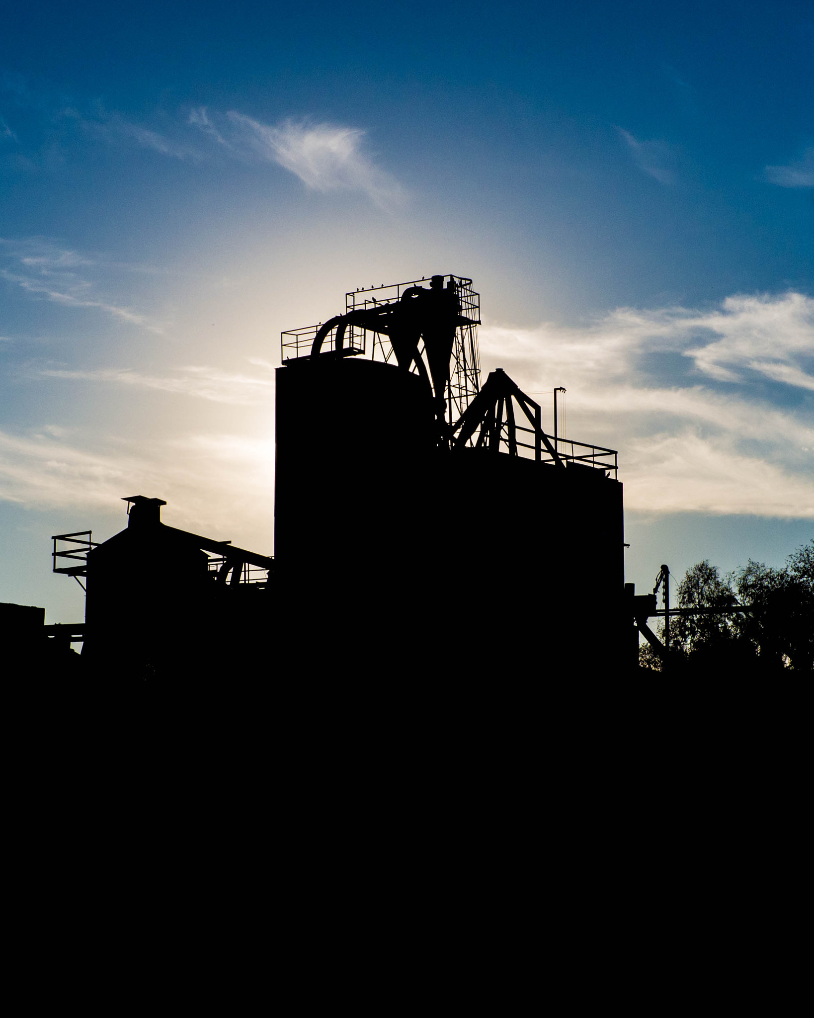 Olympus OM-D E-M10 sample photo. Grain tower before sunset photography