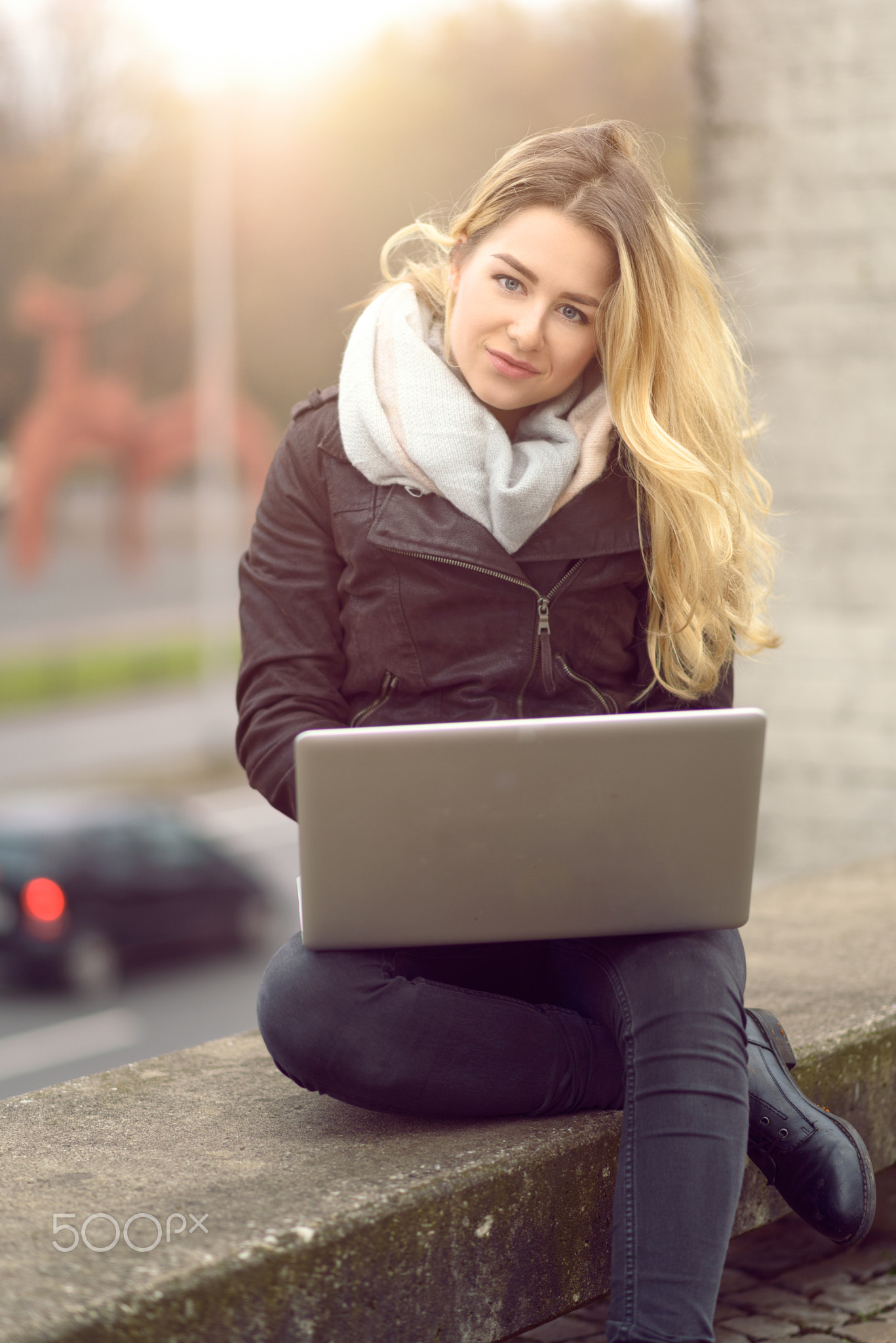 Young woman working on her laptop