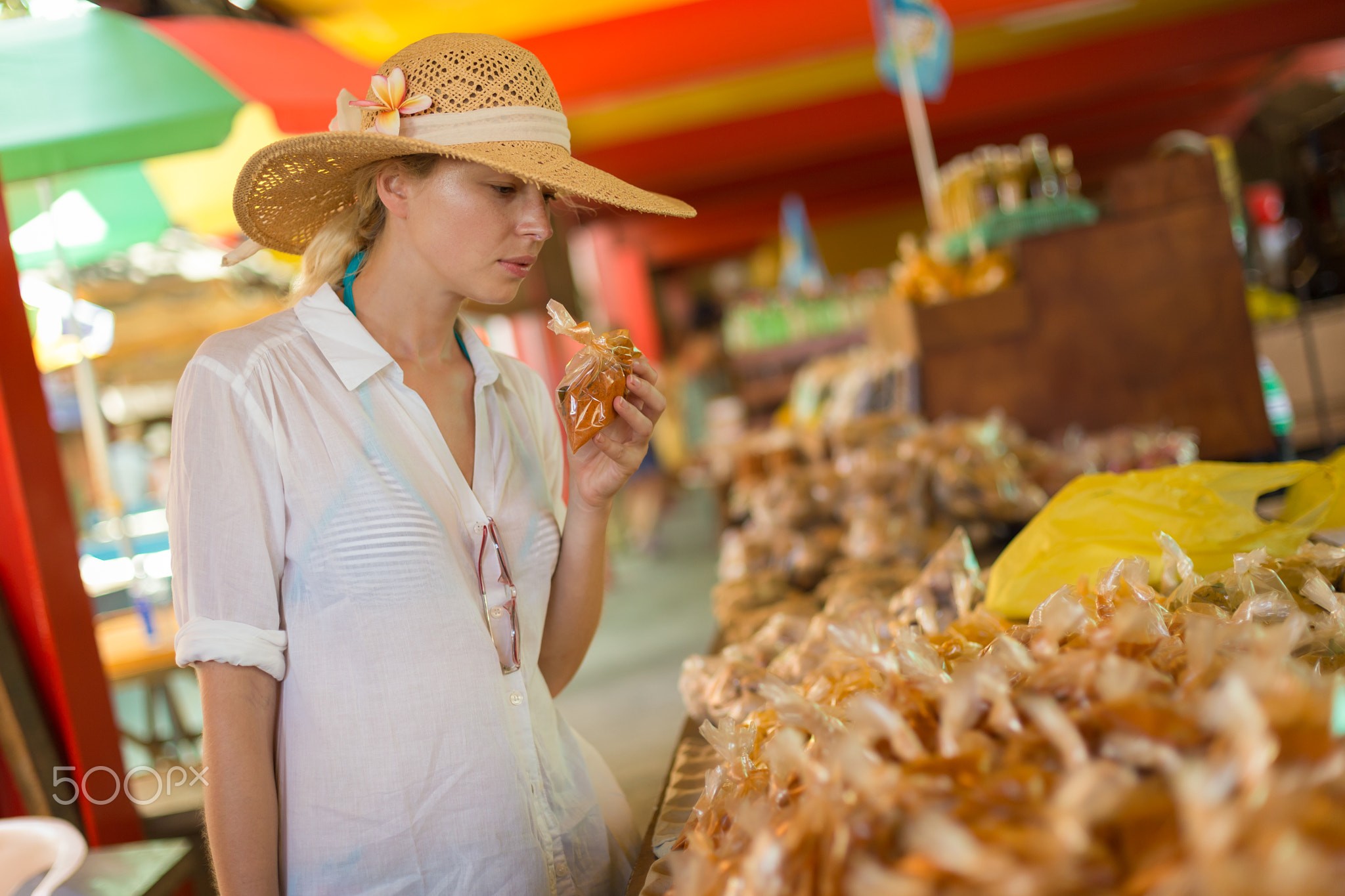 Traveler shopping on traditional Victoria food market, Seychelles.