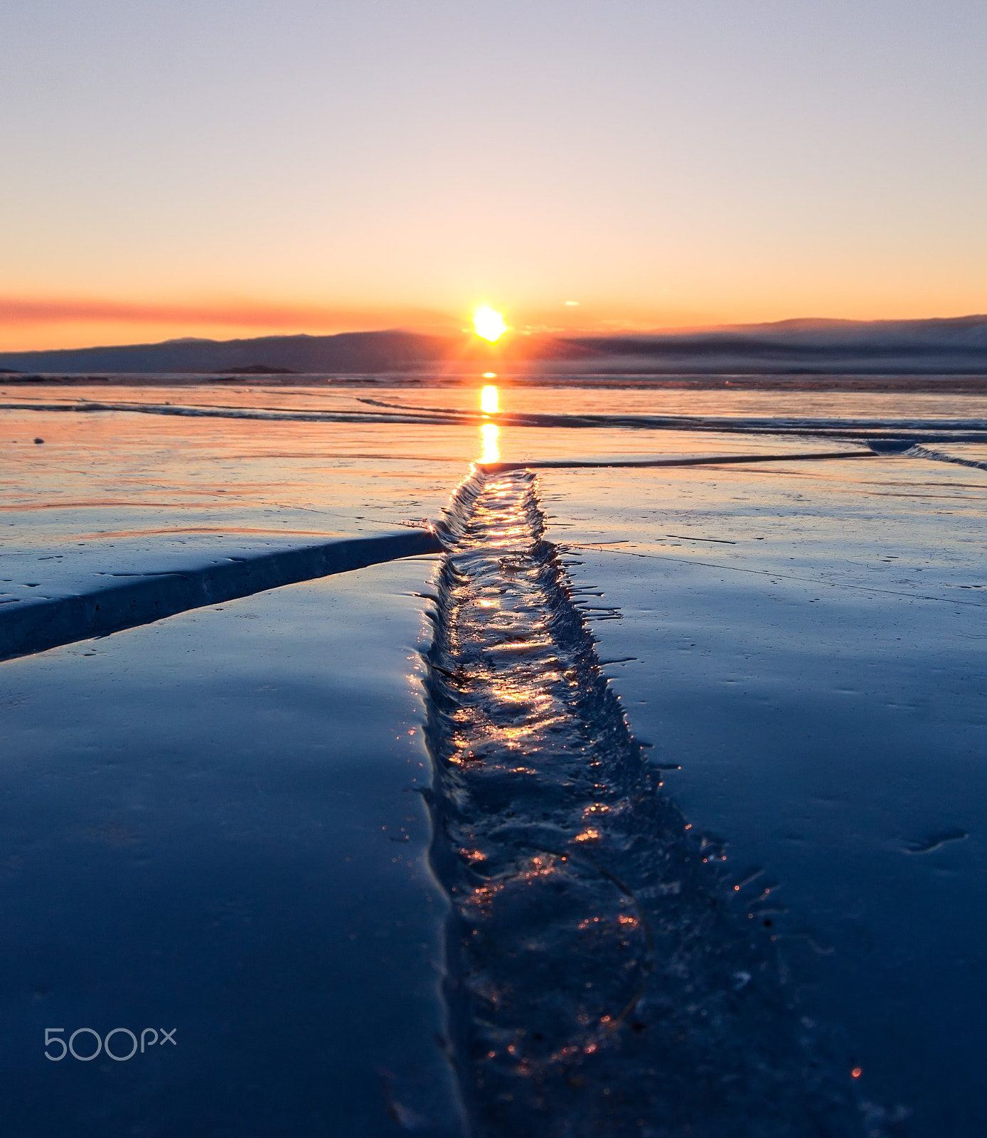 Canon EOS 1100D (EOS Rebel T3 / EOS Kiss X50) sample photo. Wide crack in the ice of lake baikal photography