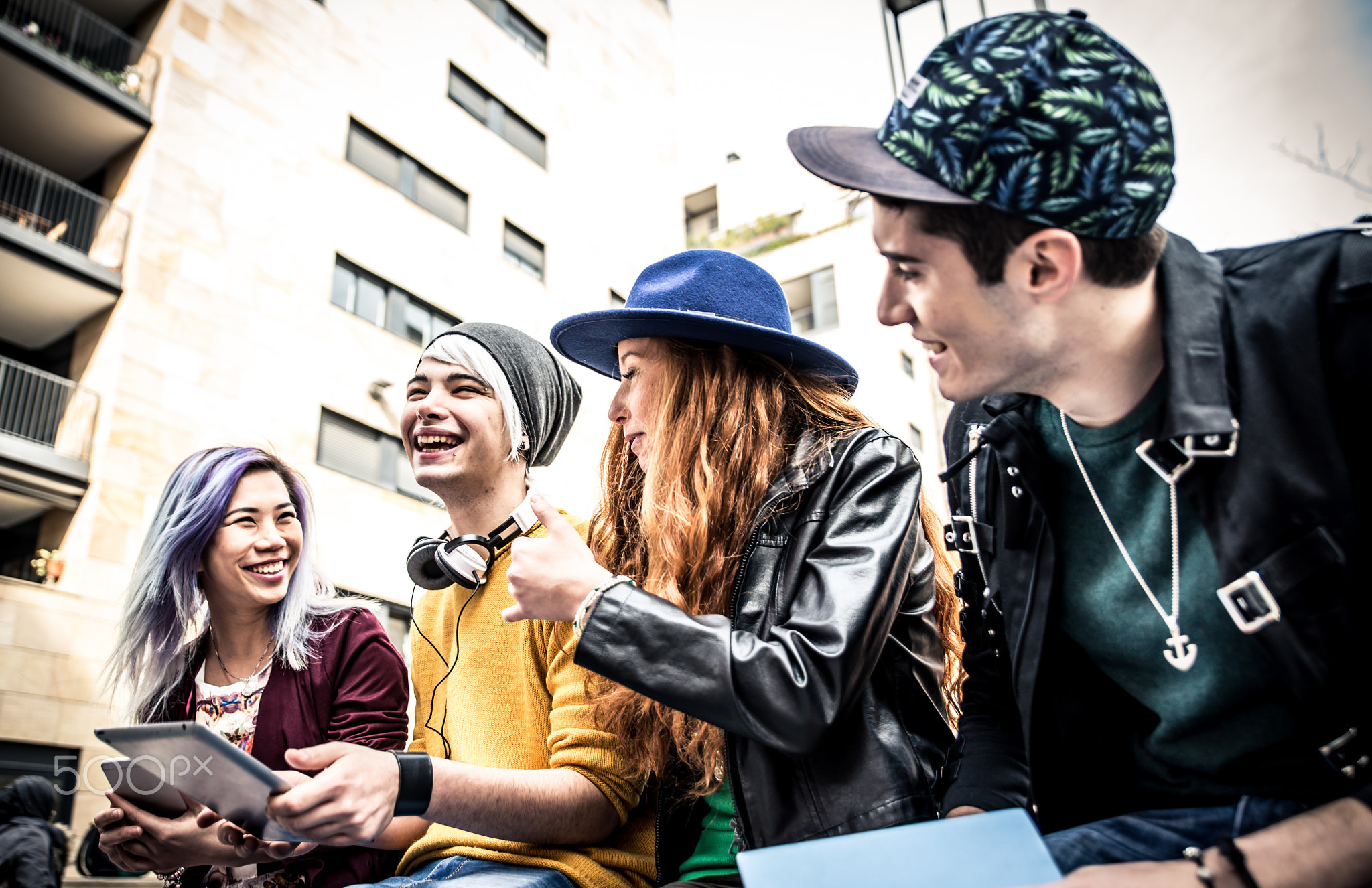 Group of students studying together in an urban area