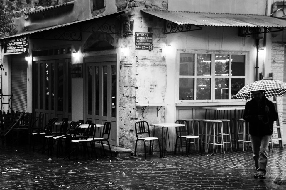 Sigma 18-250mm F3.5-6.3 DC OS HSM sample photo. The man with the umbrella photography