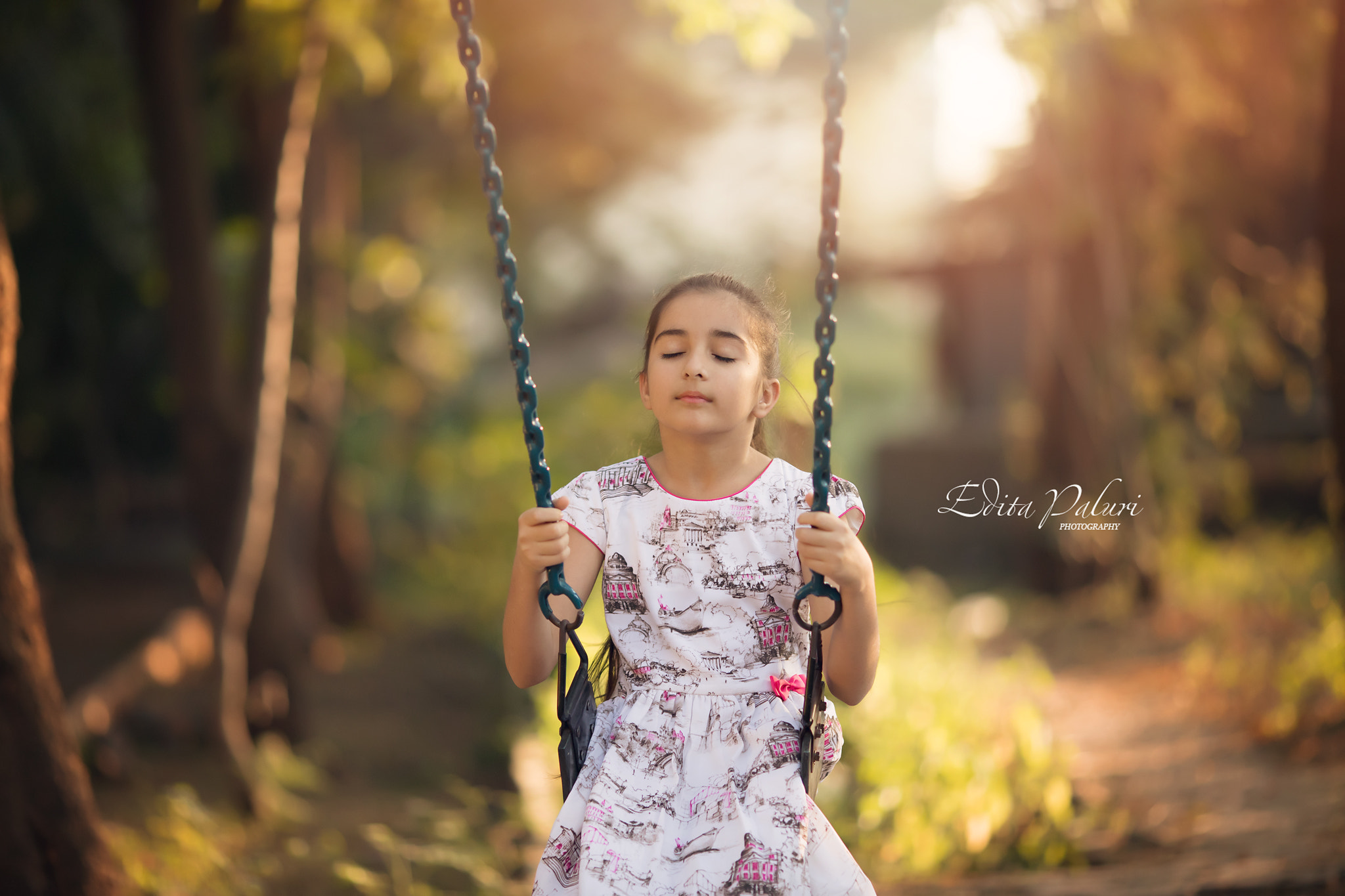 Canon EOS 5D Mark IV + Canon EF 135mm F2L USM sample photo. Girl on the swings photography