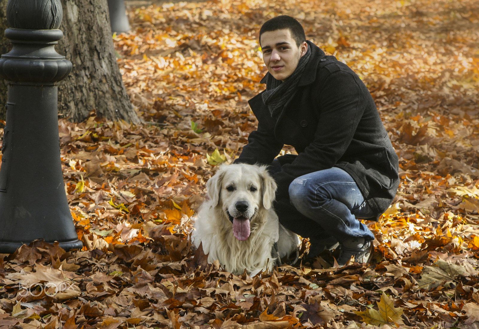 Canon EF 100-300mm F4.5-5.6 USM sample photo. Young man and his dog photography