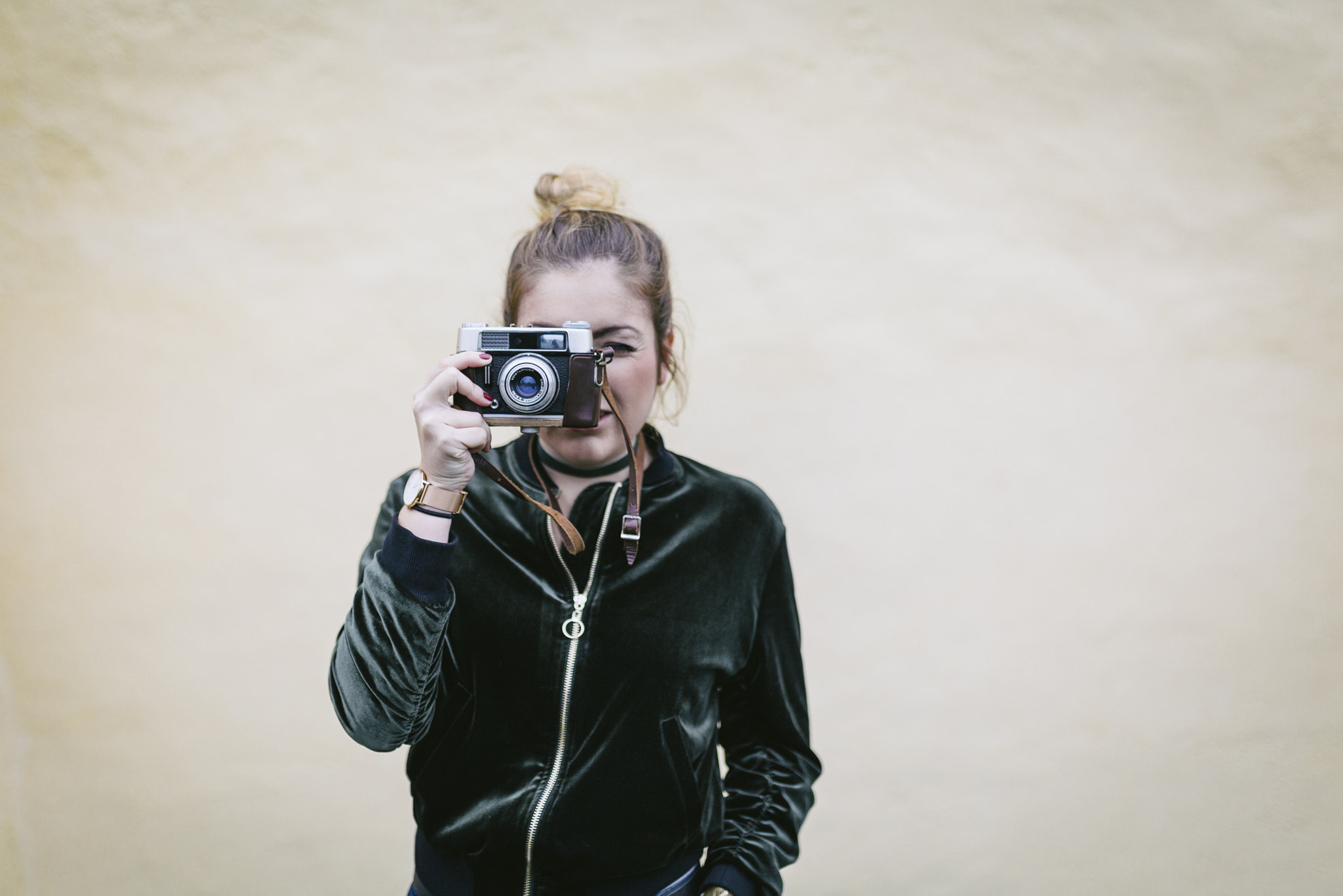 Girl holding camera