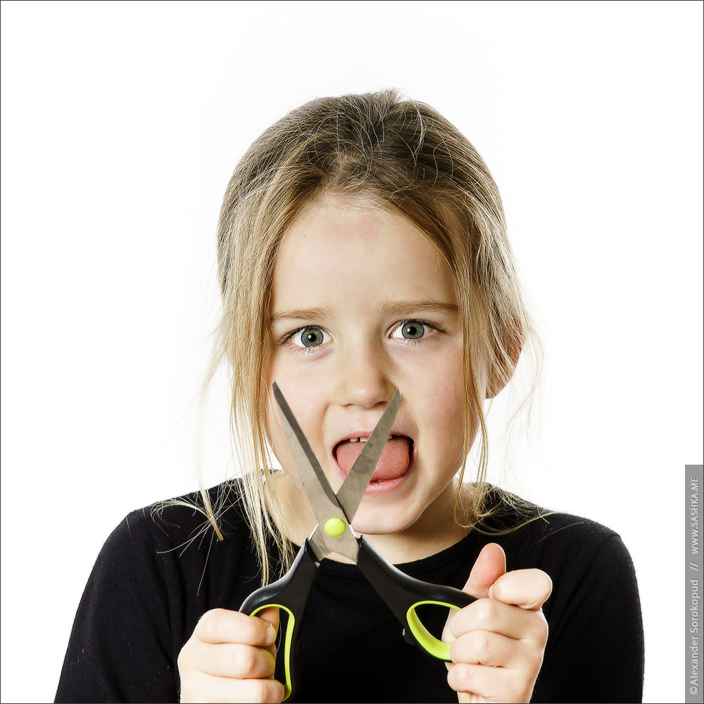 Sony a99 II sample photo. Cute little girl with scissors. self hairdresser photography