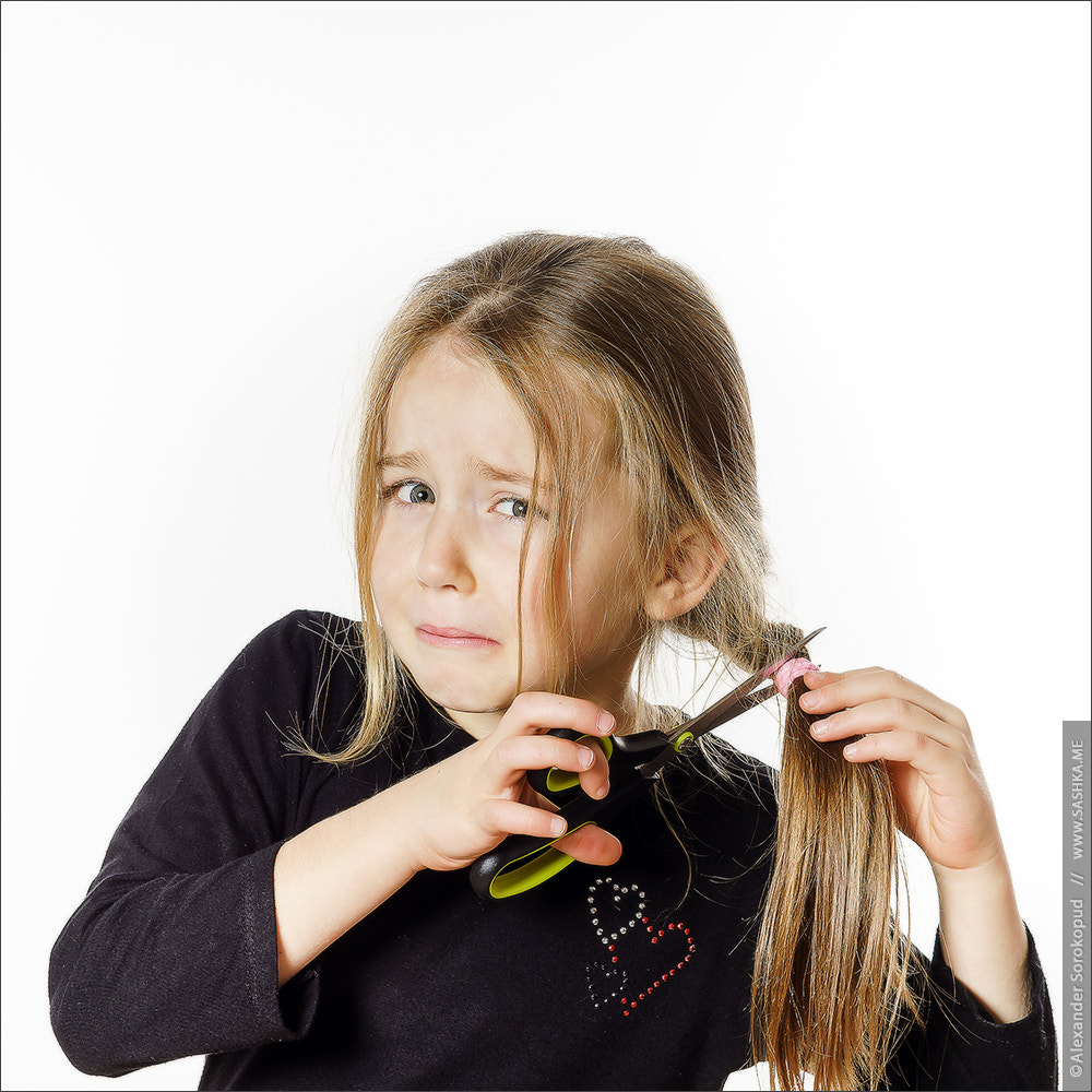 Sony a99 II sample photo. Cute little girl with scissors. self hairdresser photography