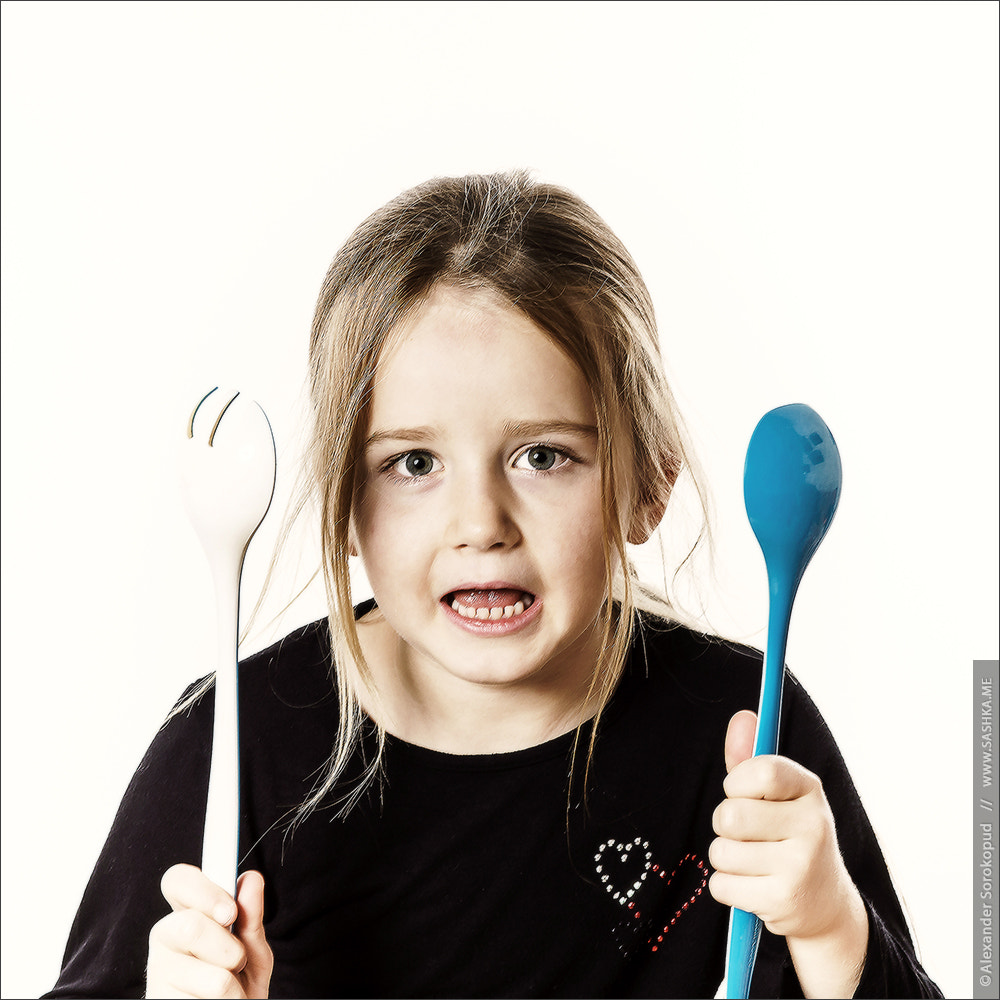 Sony a99 II sample photo. Preschooler girl playing with spoons for salad photography