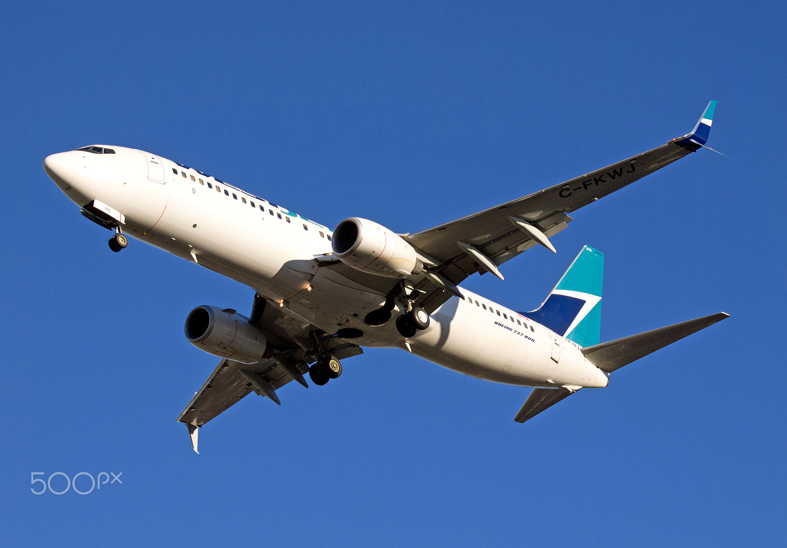 Olympus E-5 sample photo. Westjet boeing b-737-800 photography