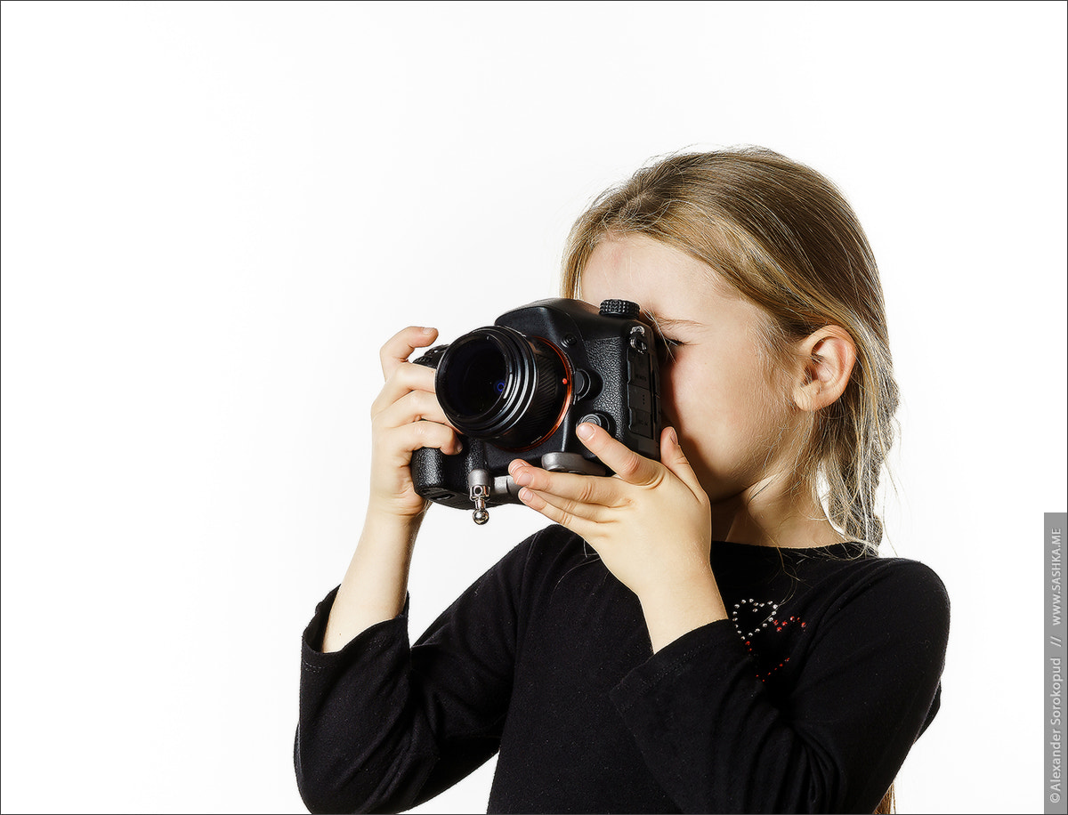 Sony a99 II sample photo. Little girl taking pictures by professional digital camera photography