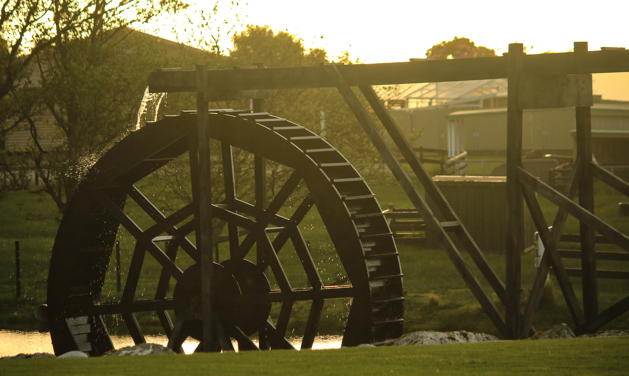 Canon EF-S 55-250mm F4-5.6 IS II sample photo. Water wheel at dusk photography