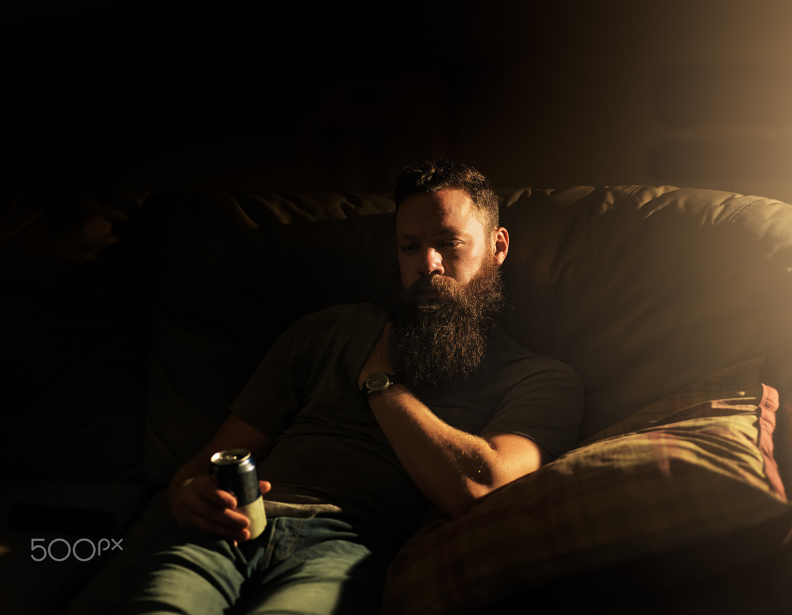 Hasselblad H3DII-39 + HC 80 sample photo. Depressed looking man drinking beer in the dark photography