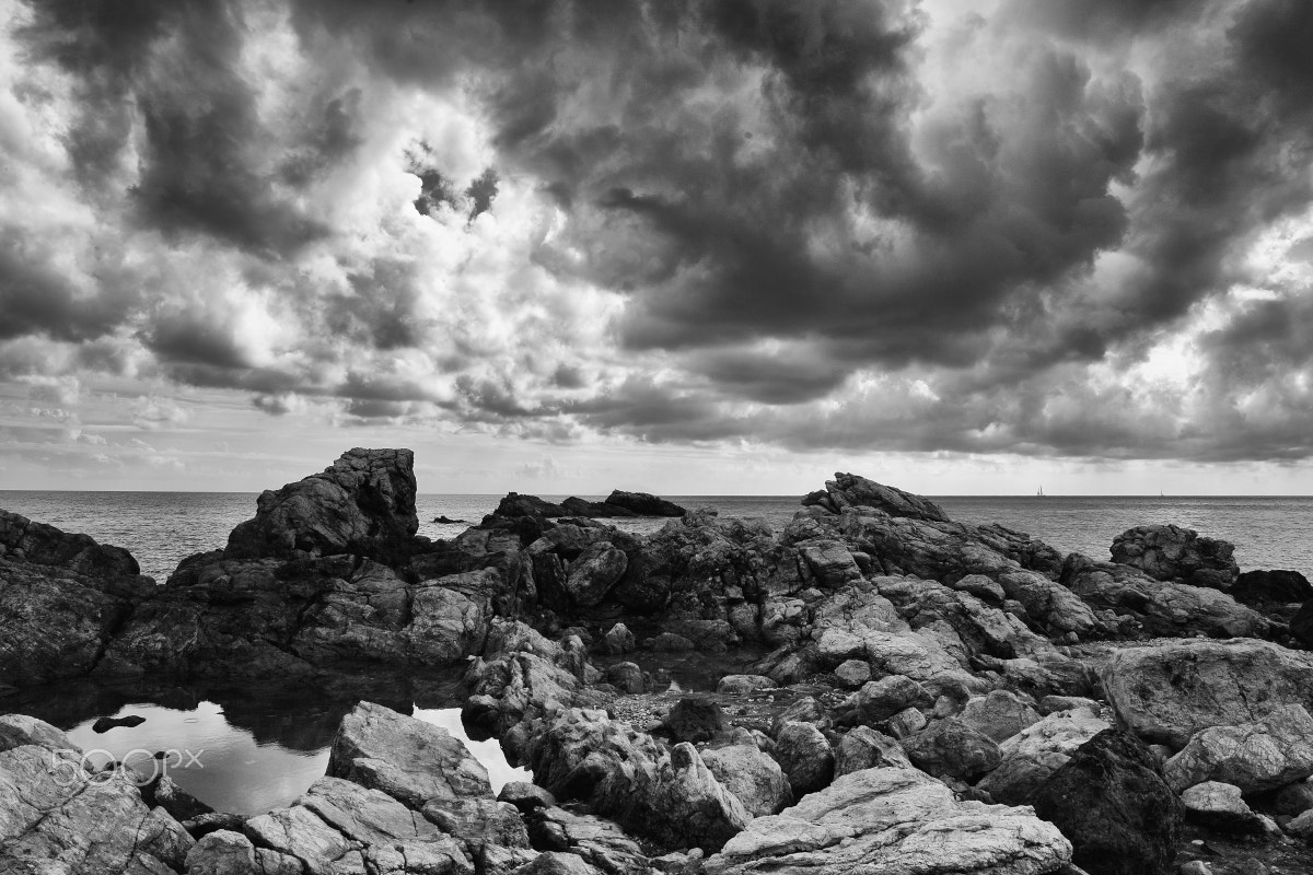 Canon EF 24-70mm F4L IS USM sample photo. Rocks and sky photography