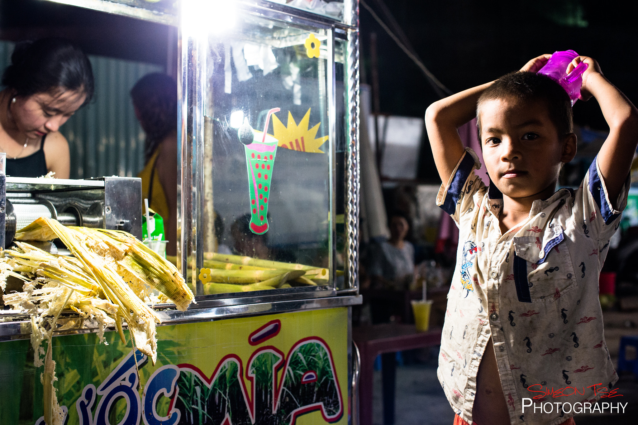 Nikon D4S + Nikon AF-S Nikkor 50mm F1.4G sample photo. Waiting for his fresh sugar cane juice photography