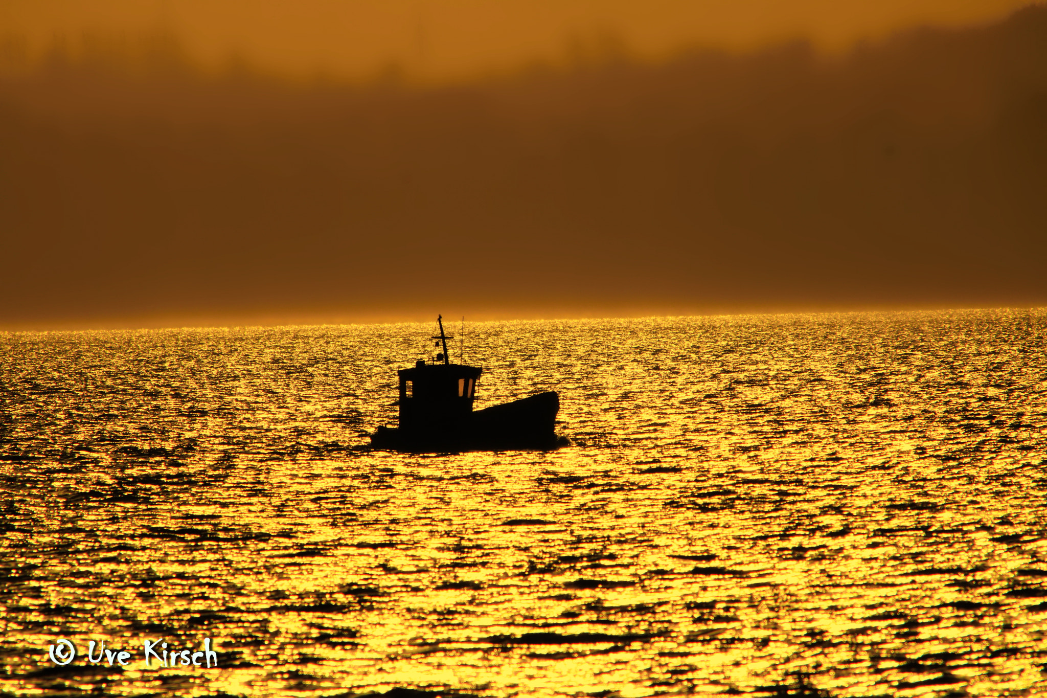 Sigma 150-500mm F5-6.3 DG OS HSM sample photo. Tiny fishing boat in the morning photography