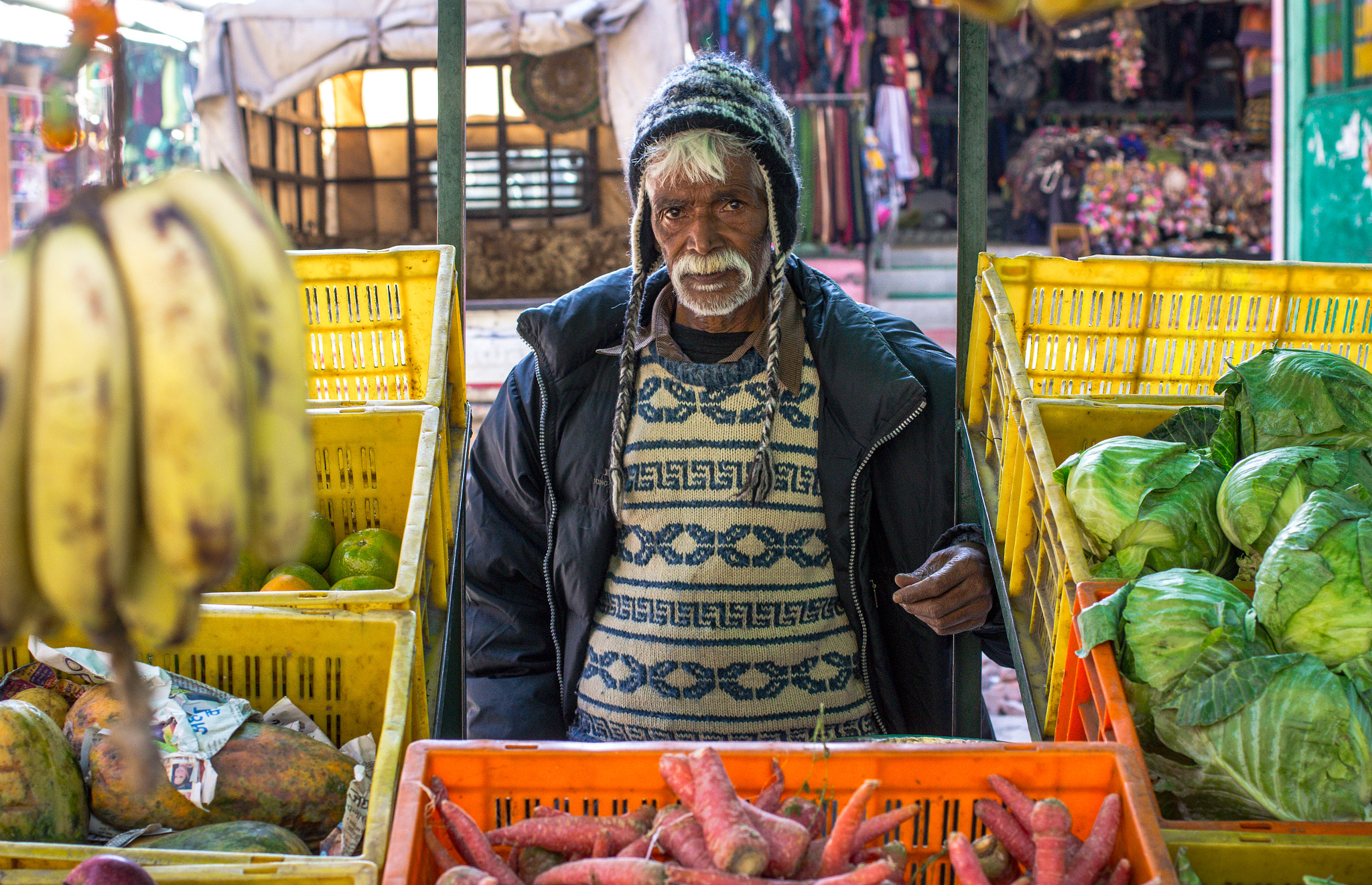 Canon EOS 600D (Rebel EOS T3i / EOS Kiss X5) + Canon EF 40mm F2.8 STM sample photo. Vegetable_vendor photography