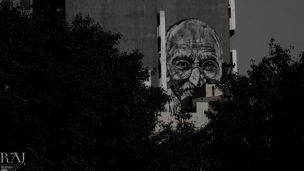 Canon EF 75-300mm f/4-5.6 USM sample photo. A watch over everyone (father of the nation) photography