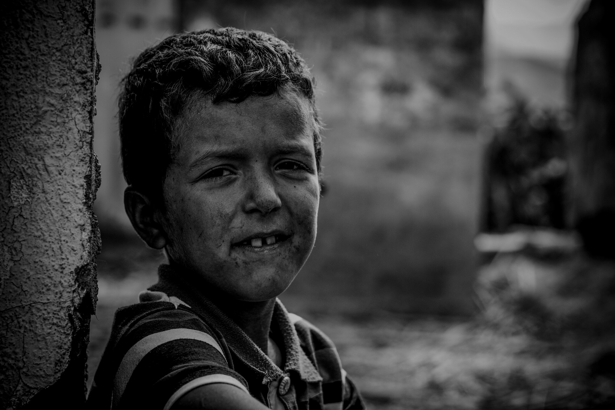 Canon EOS 7D + Canon EF 50mm F1.8 II sample photo. Sad smile photography