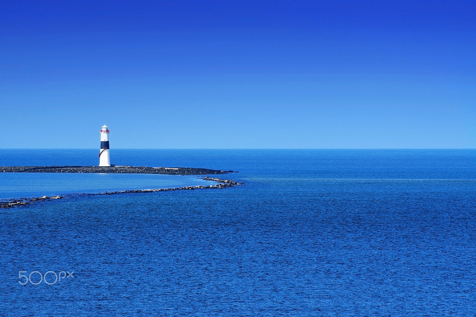 Nikon D5000 sample photo. Lighthouse at ireland photography