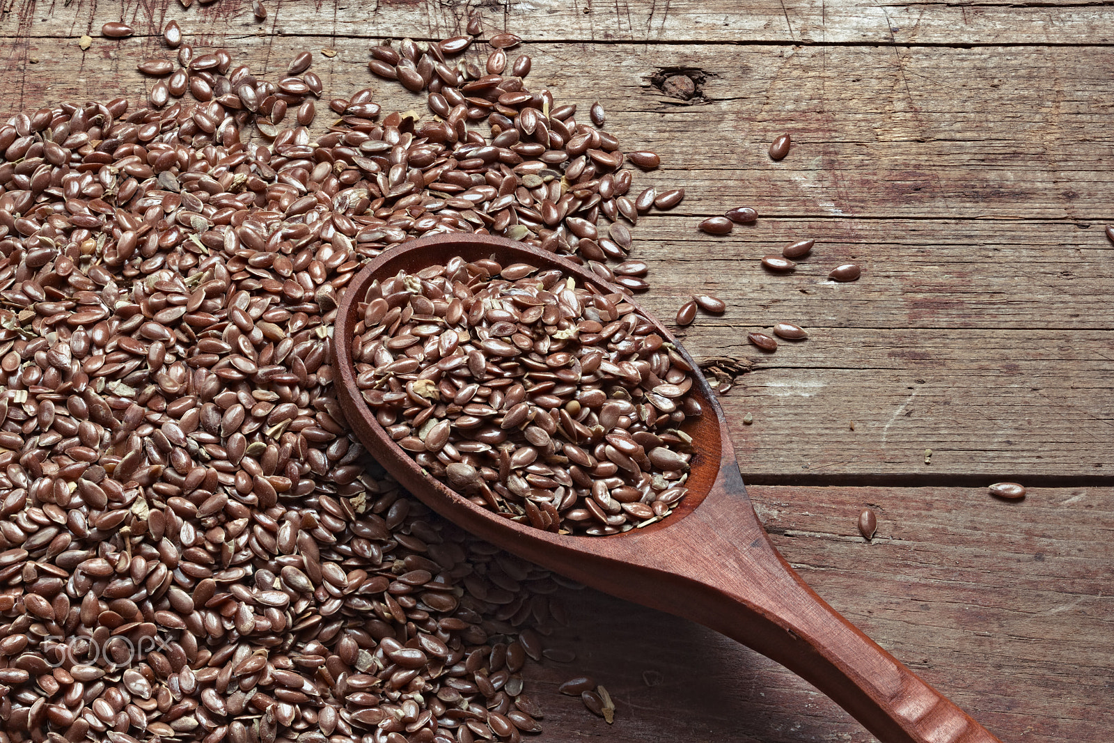 Canon EOS 650D (EOS Rebel T4i / EOS Kiss X6i) sample photo. Flax seeds on a wooden background and spoon photography
