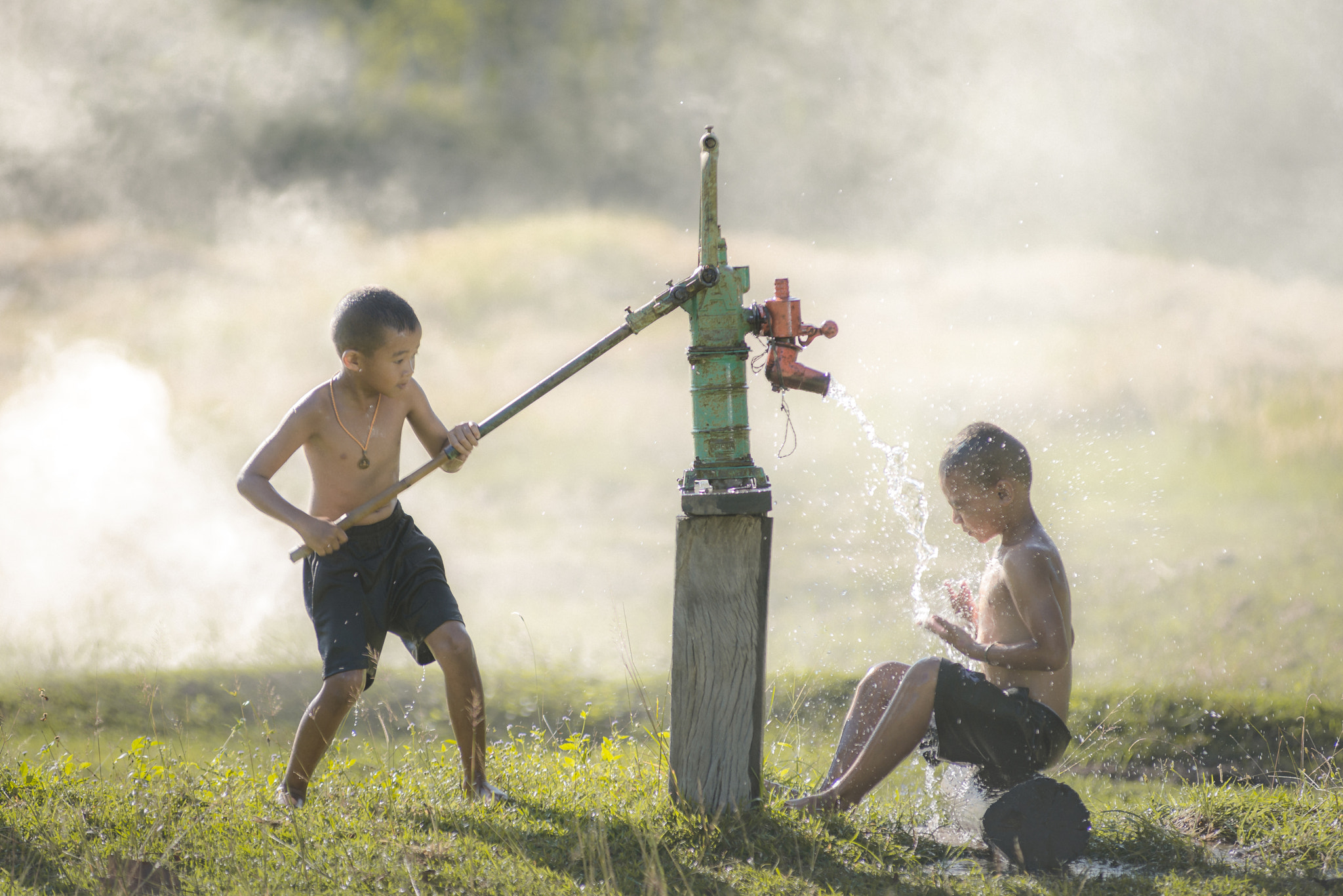 Nikon D800E sample photo. Thailand boy two players  rocking water photography
