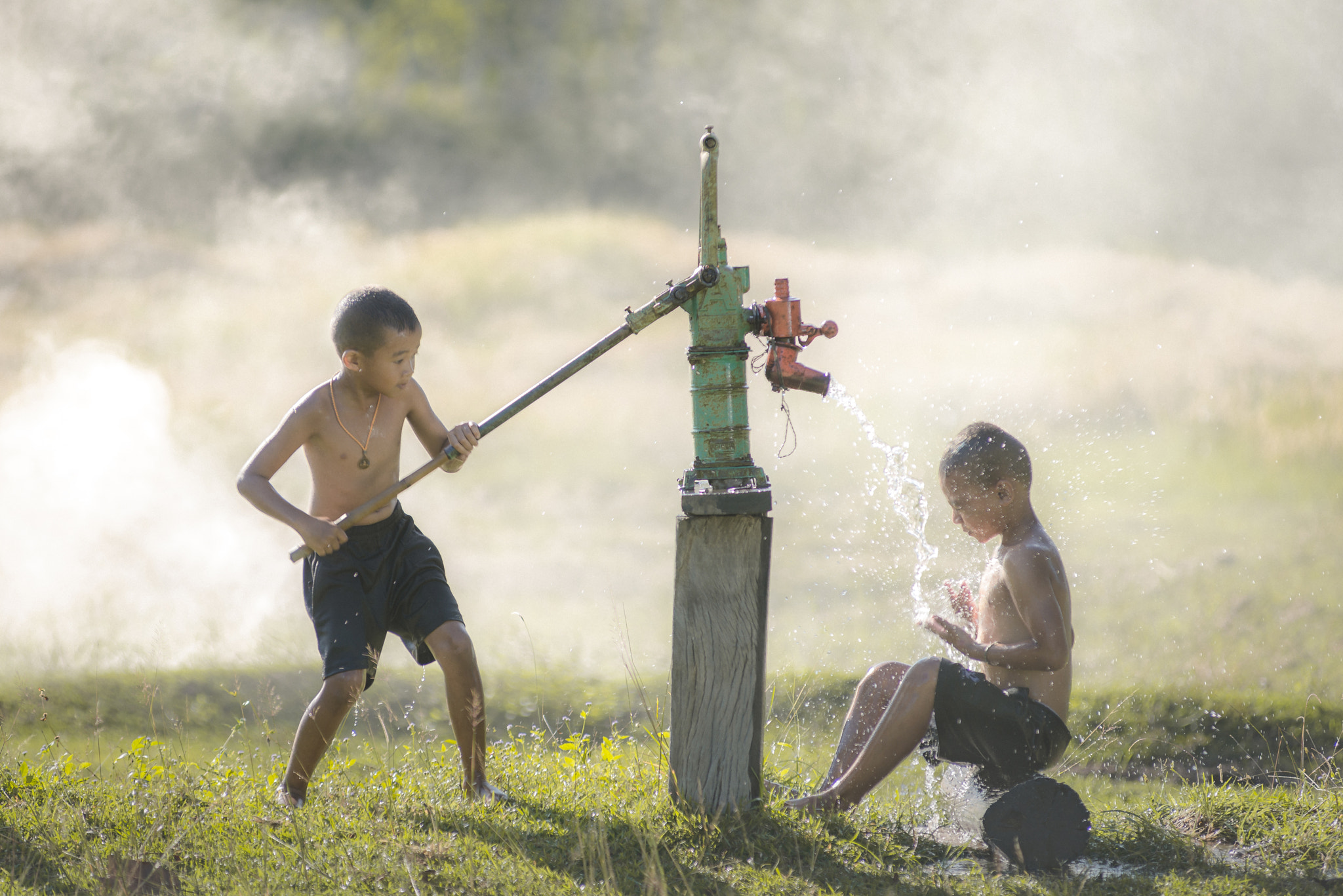 Nikon AF-Nikkor 80-200mm F2.8D ED sample photo. Thailand boy two players  rocking water photography