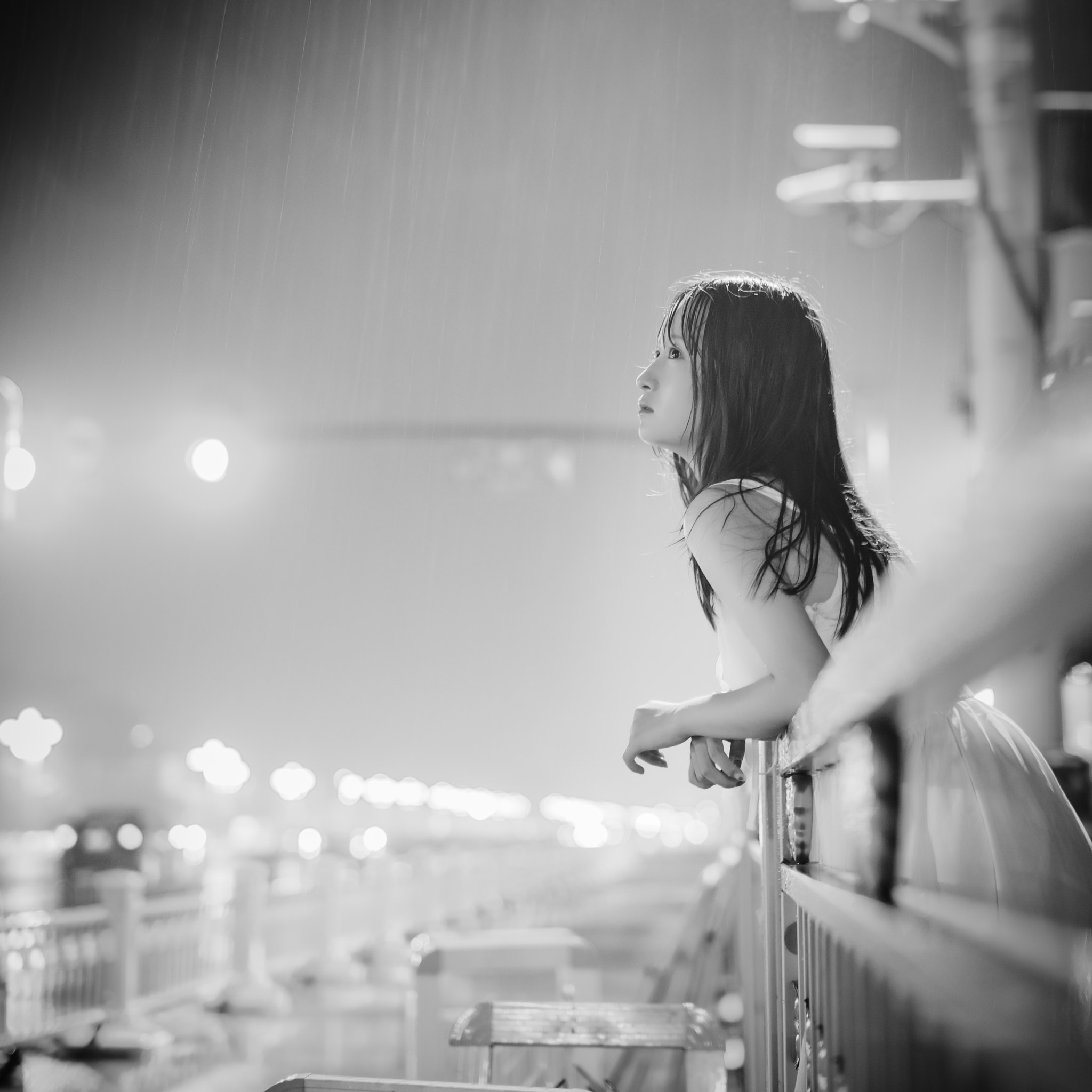 Sony Planar T* 50mm F1.4 ZA SSM sample photo. Girl in the rain photography