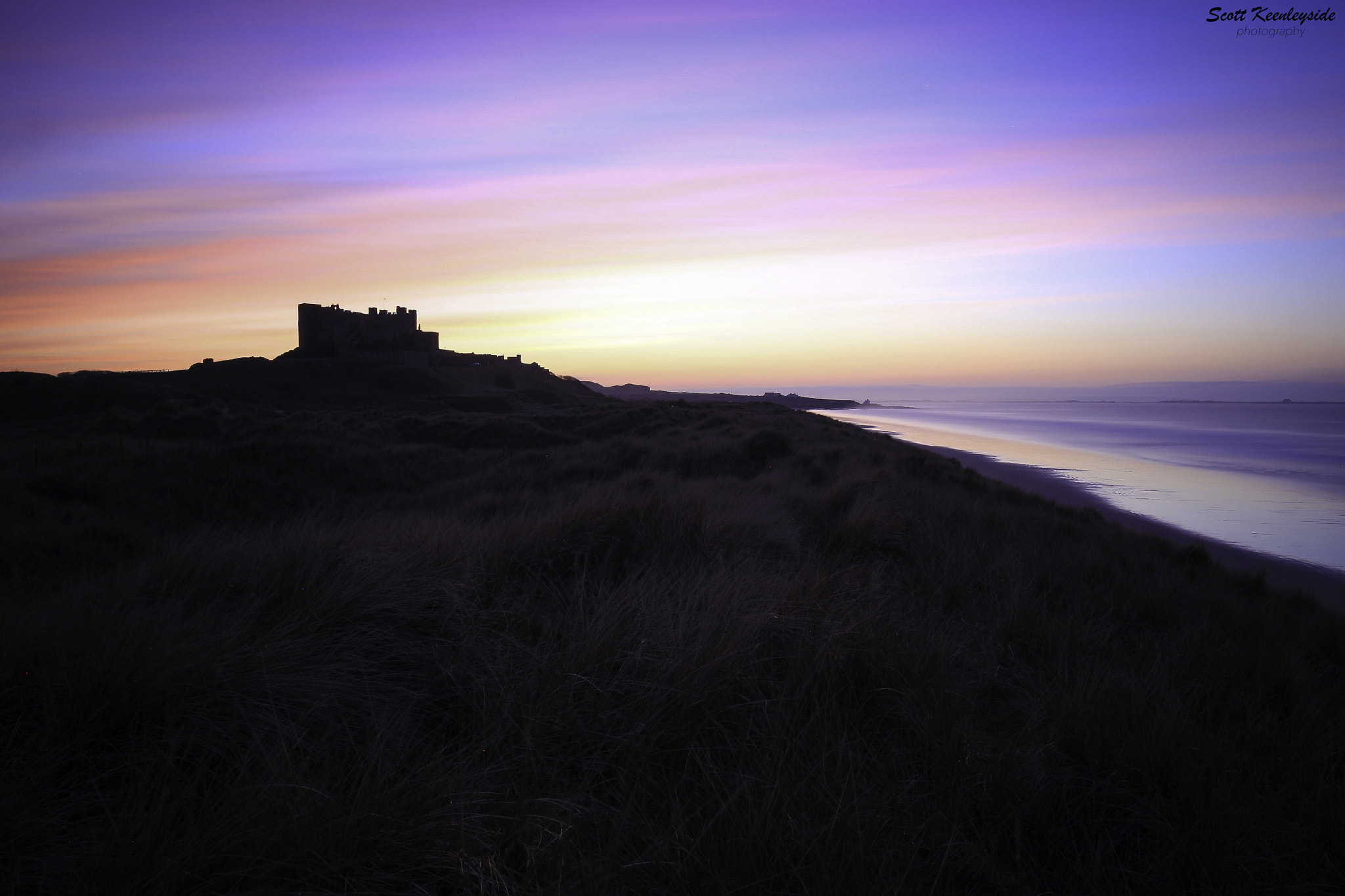 Canon EOS 70D + Canon EF 16-35mm F4L IS USM sample photo. Bamburgh castle sunset, northumberland coast. photography